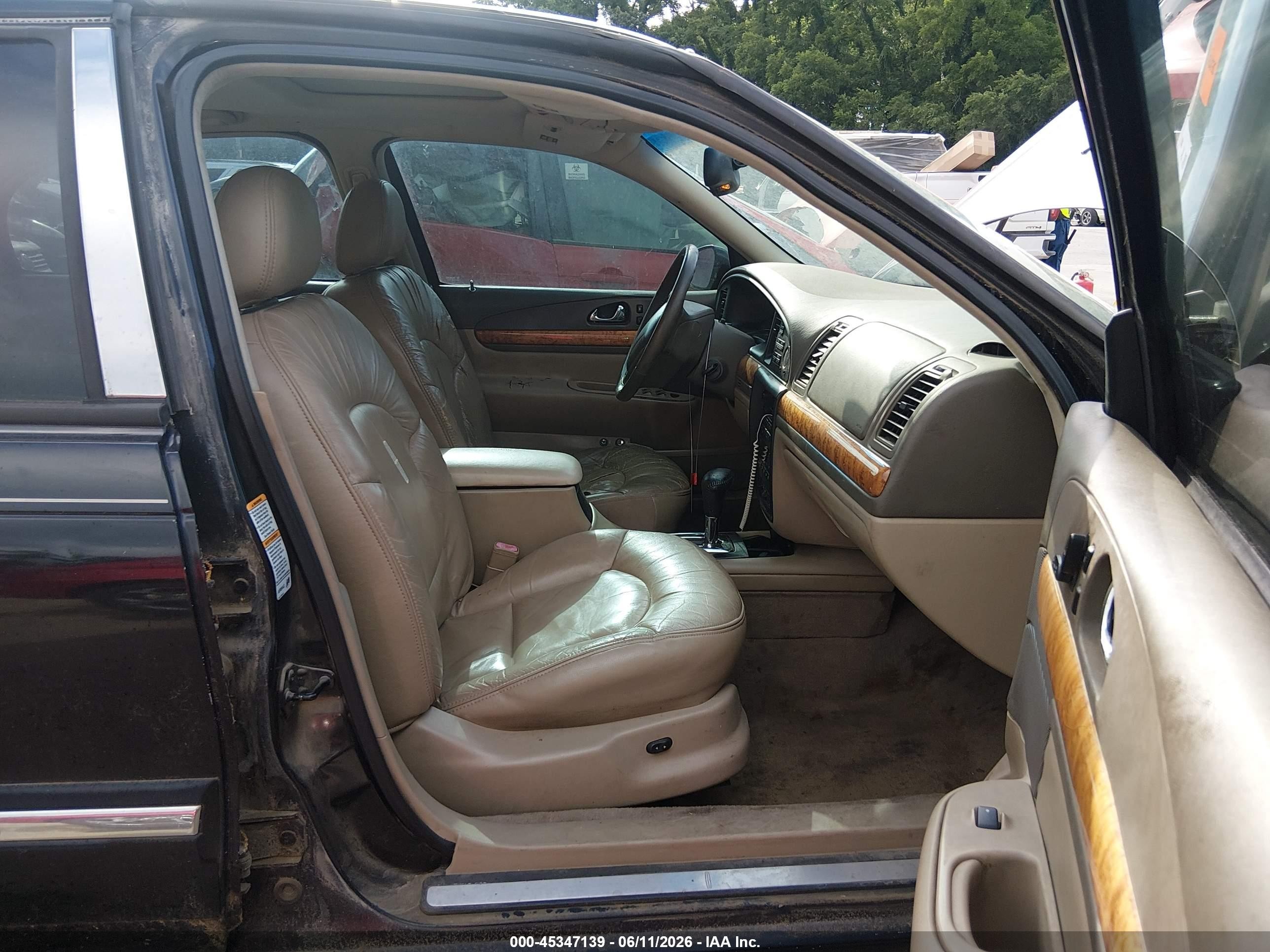 2000 Lincoln Continental   Black vin: 1LNHM97V0YY779745