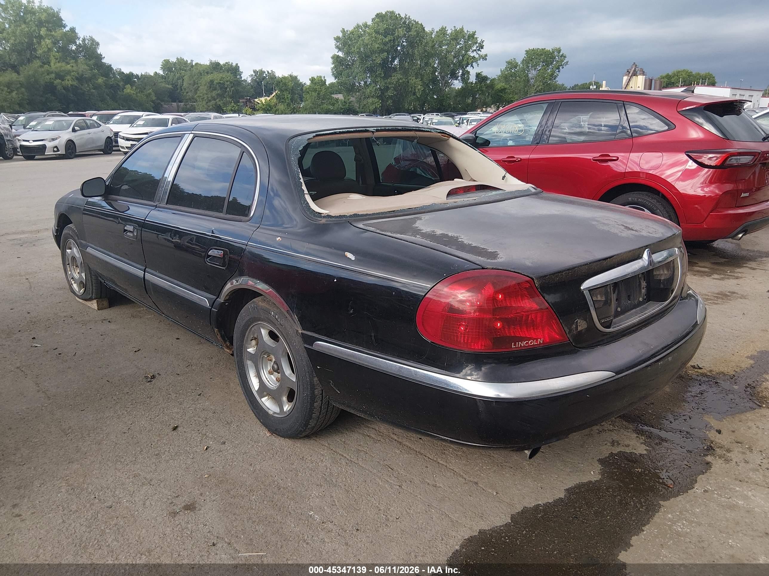 2000 Lincoln Continental   Black vin: 1LNHM97V0YY779745