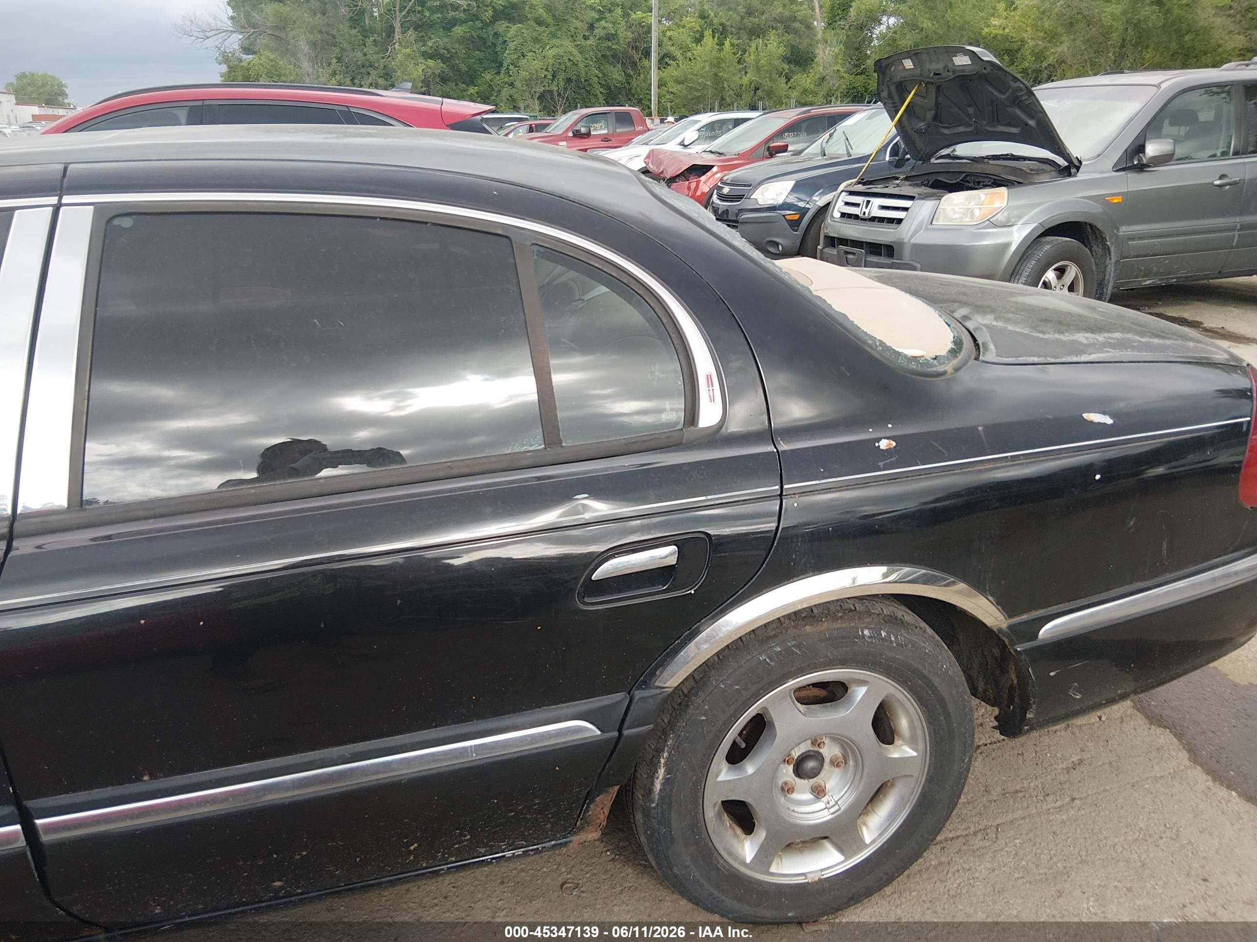 2000 Lincoln Continental   Black vin: 1LNHM97V0YY779745