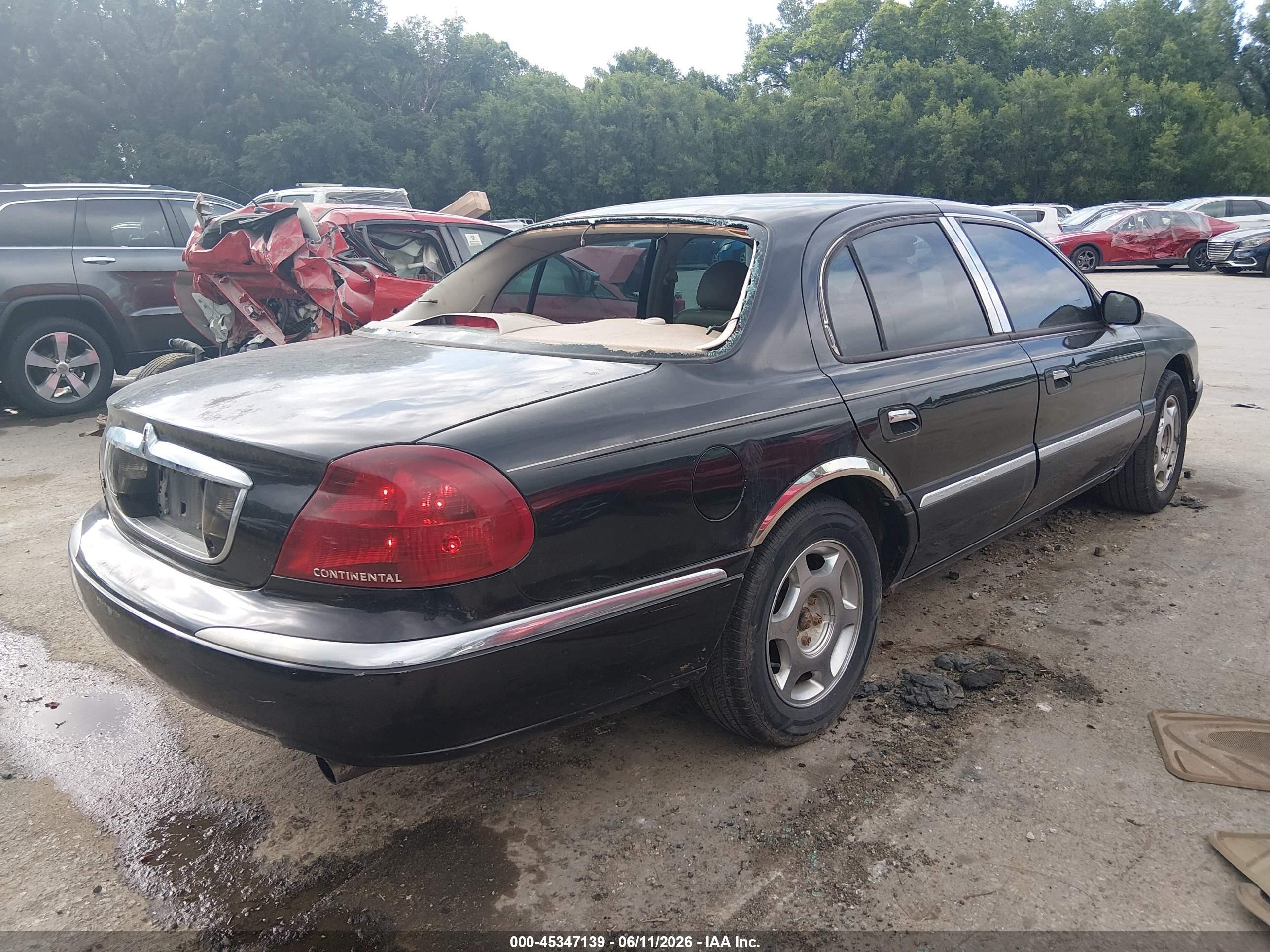 2000 Lincoln Continental   Black vin: 1LNHM97V0YY779745
