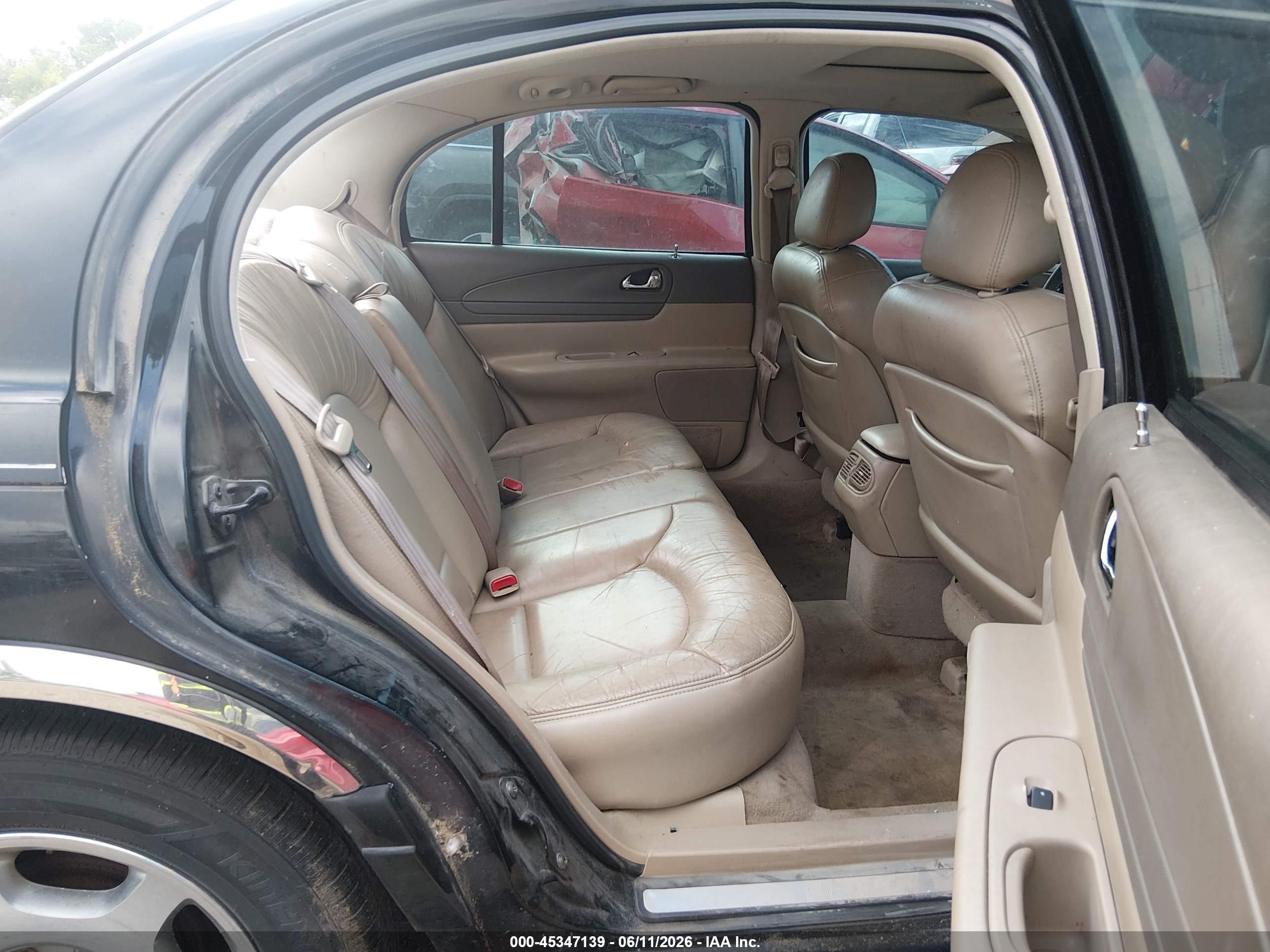 2000 Lincoln Continental   Black vin: 1LNHM97V0YY779745