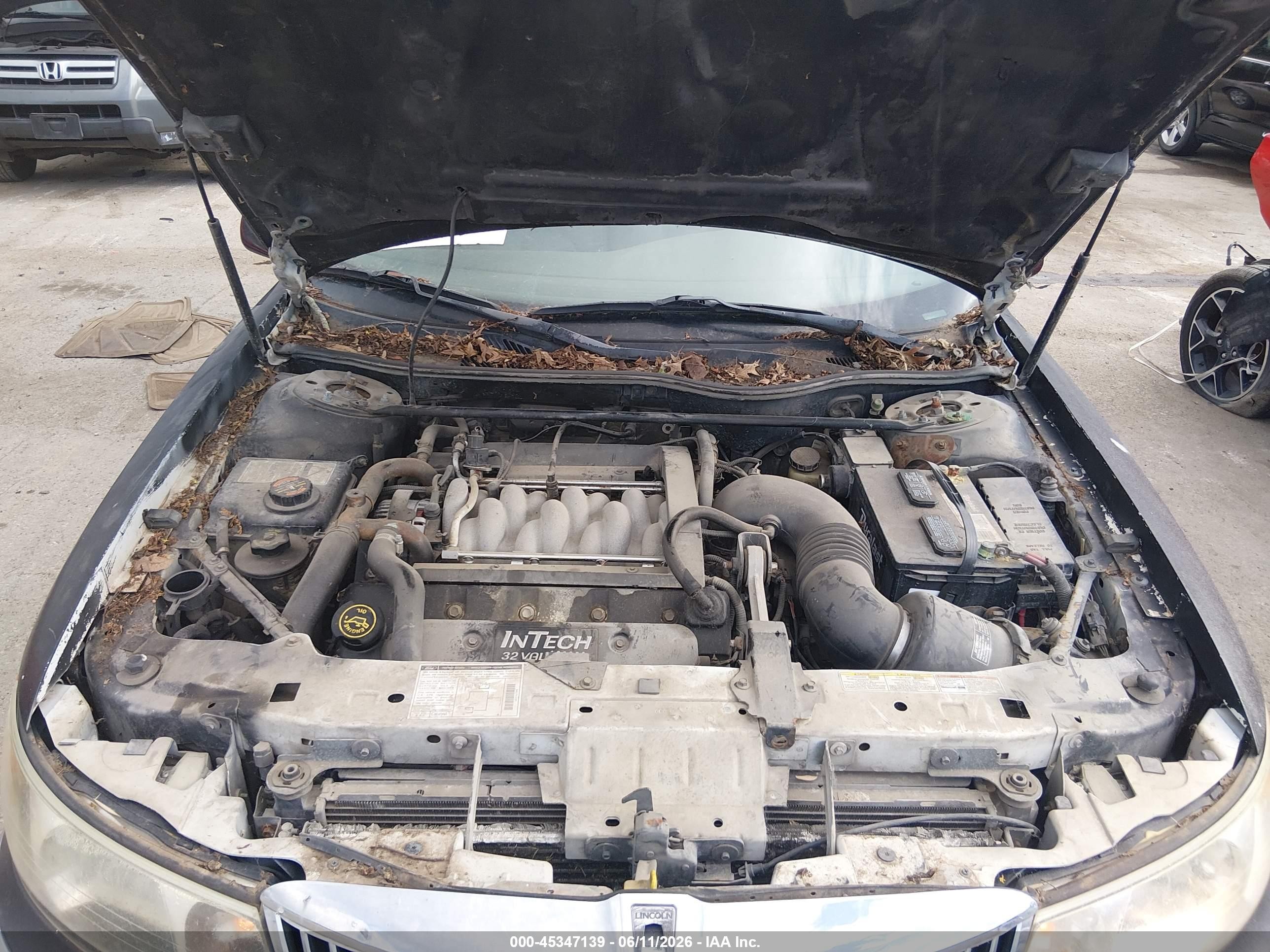 2000 Lincoln Continental   Black vin: 1LNHM97V0YY779745