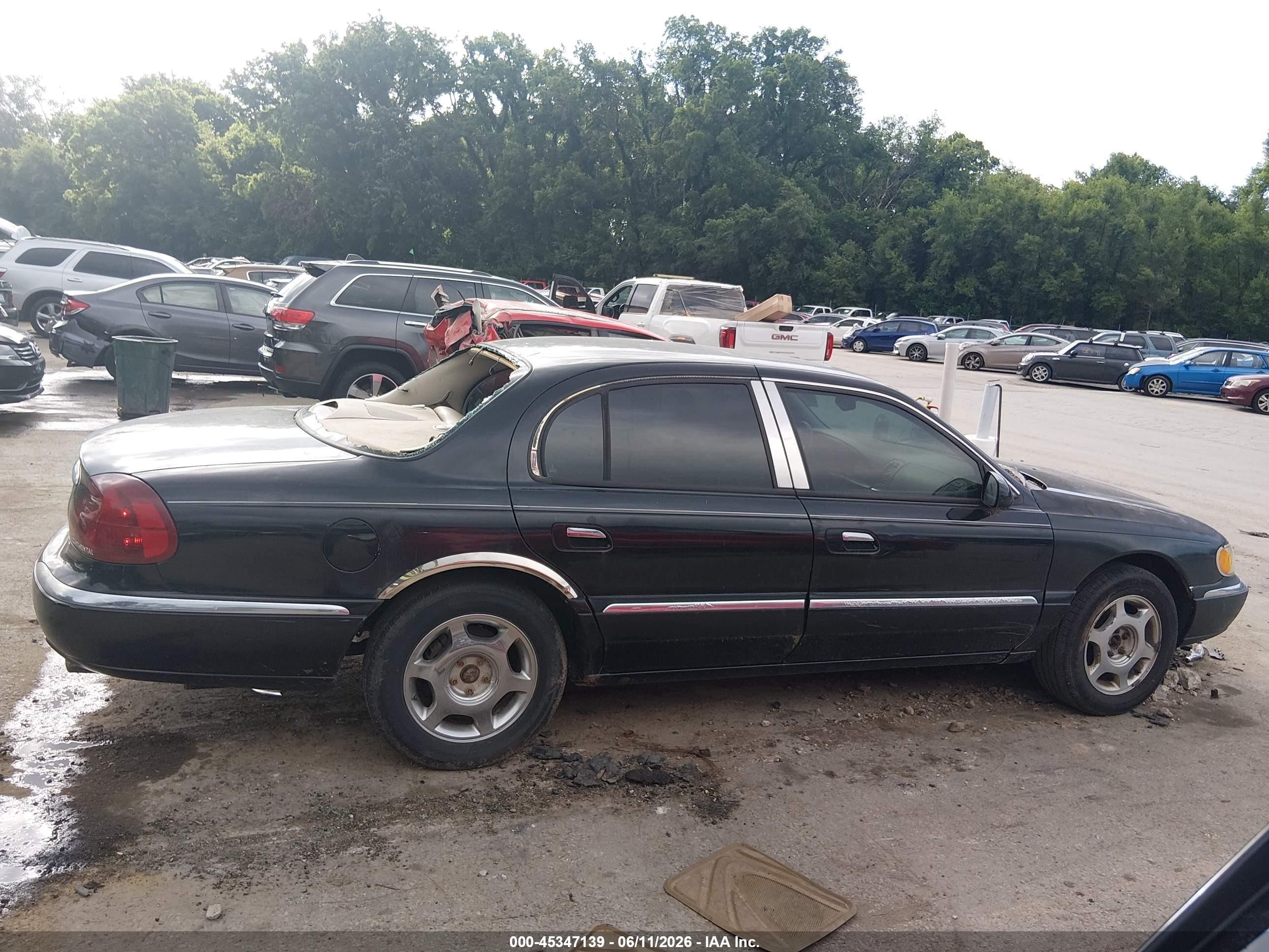 2000 Lincoln Continental   Black vin: 1LNHM97V0YY779745