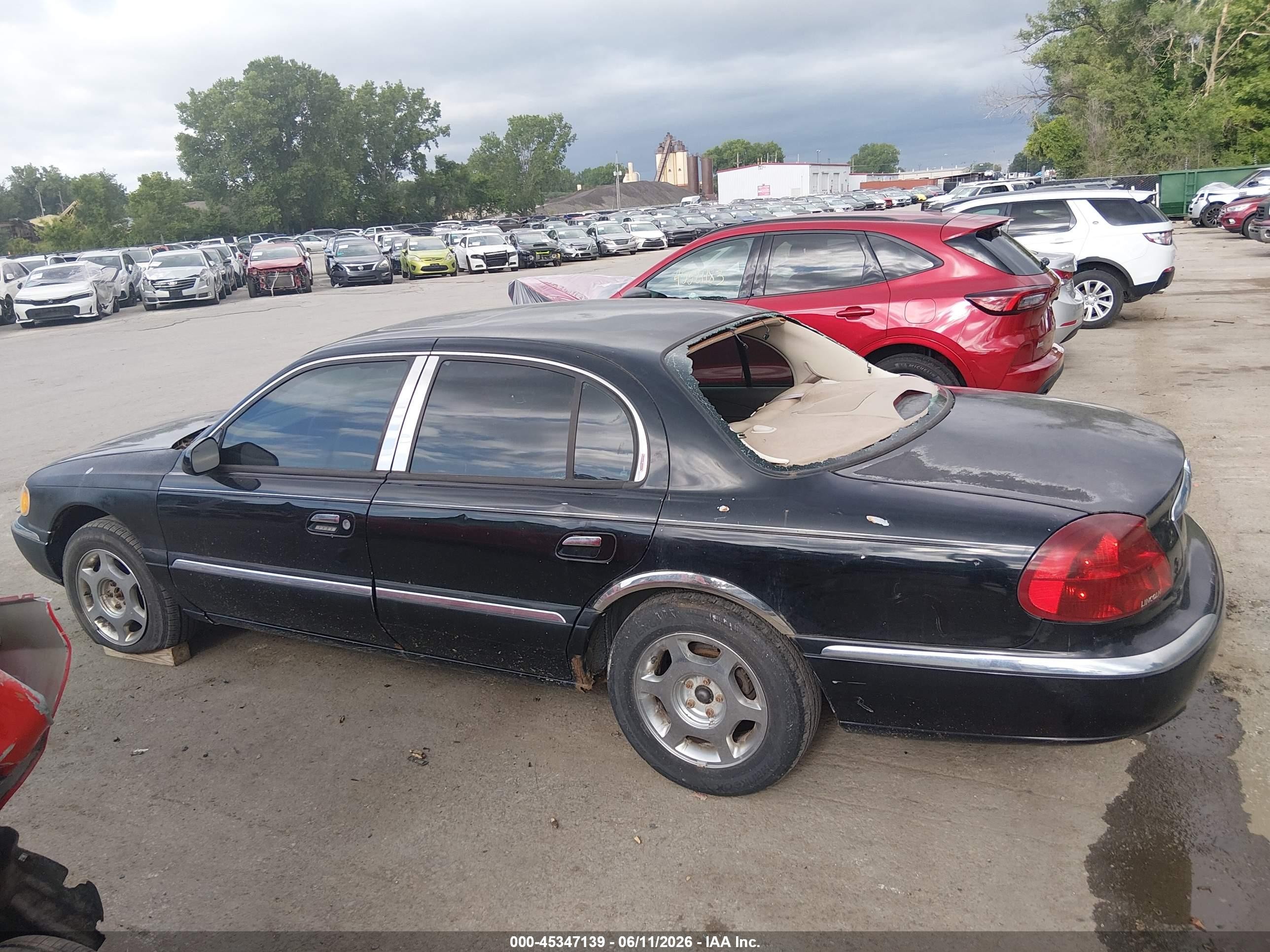 2000 Lincoln Continental   Black vin: 1LNHM97V0YY779745