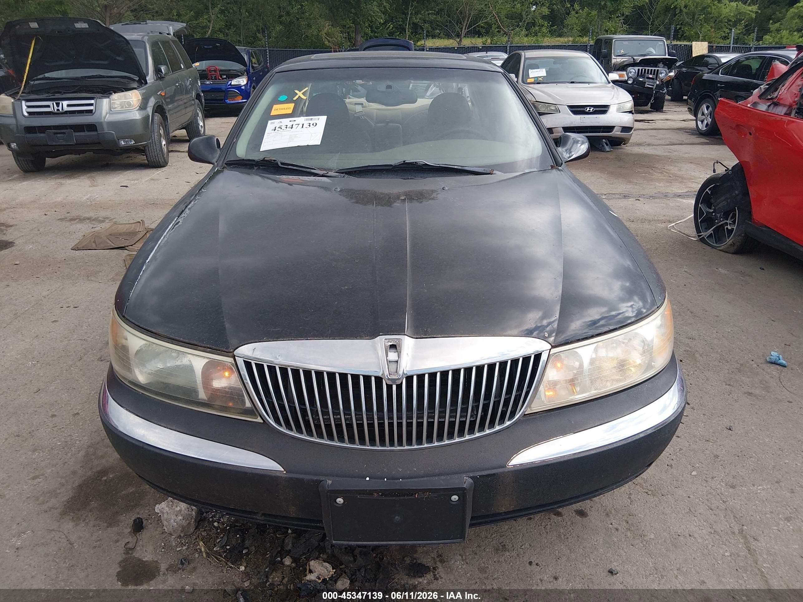 2000 Lincoln Continental   Black vin: 1LNHM97V0YY779745