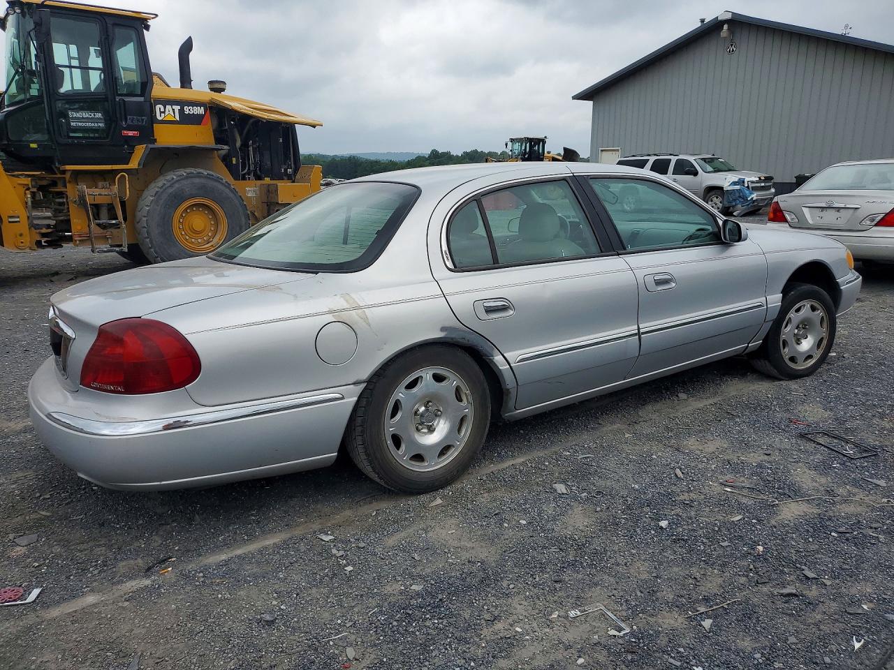 2000 Lincoln Continental Silver vin: 1LNHM97V0YY874645