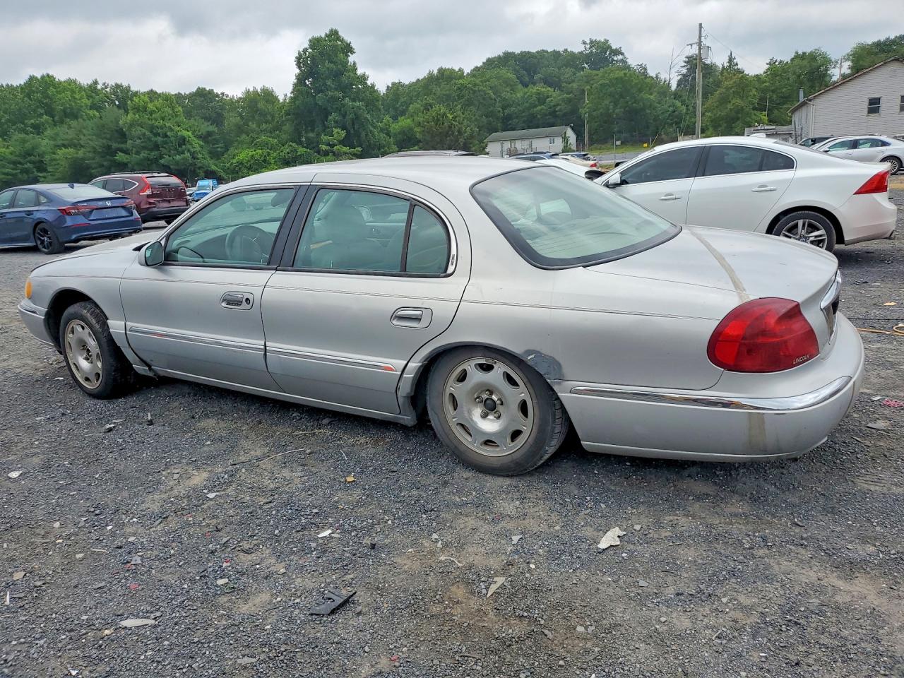 2000 Lincoln Continental Silver vin: 1LNHM97V0YY874645