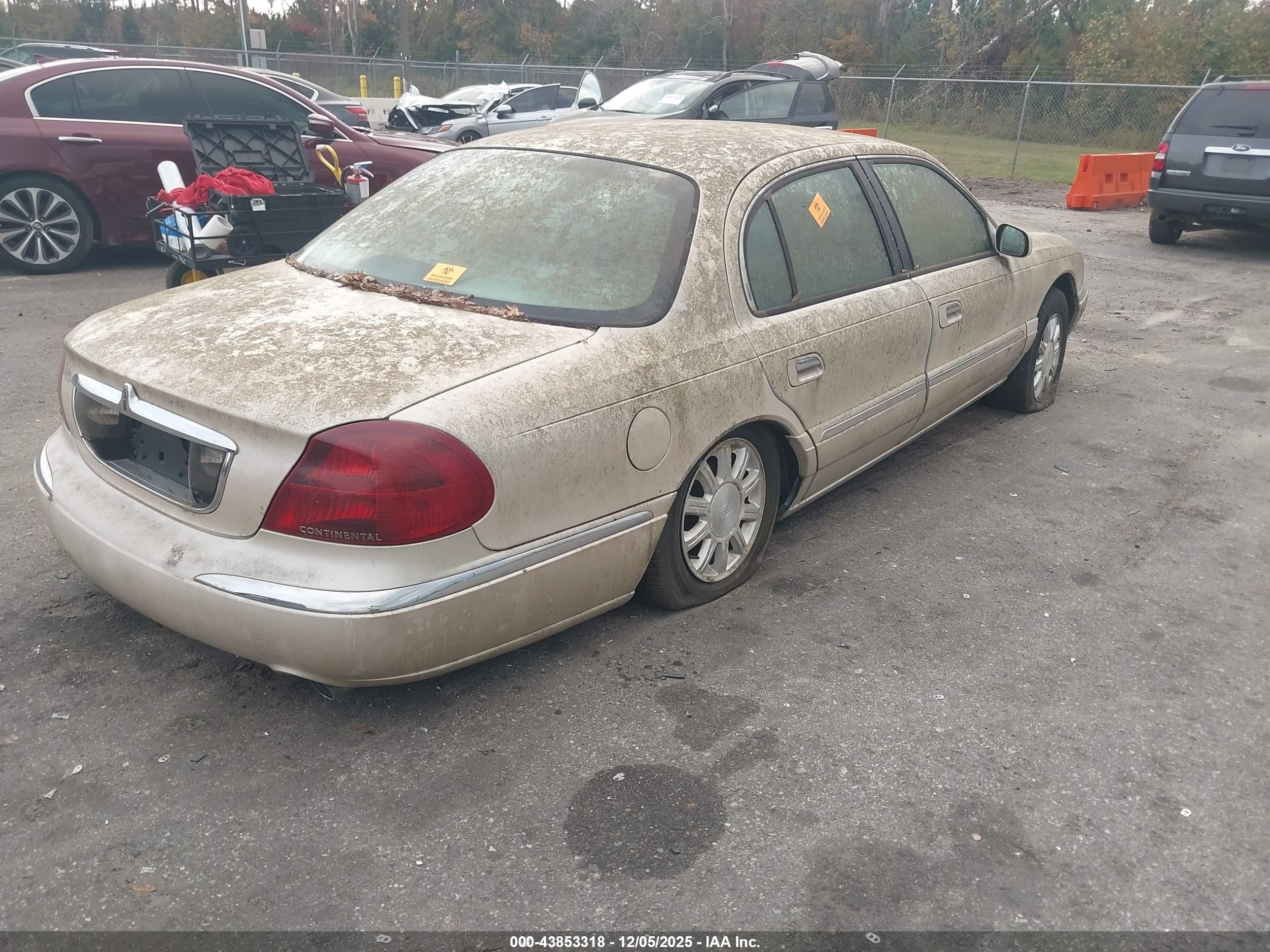 1999 Lincoln Continental   Champagne vin: 1LNHM97V1XY697540