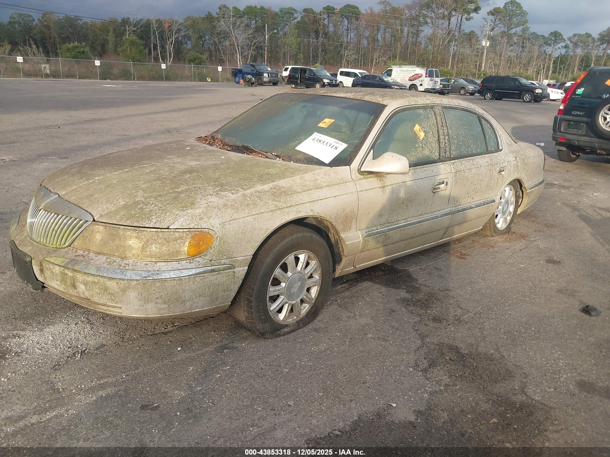 1999 Lincoln Continental   Champagne vin: 1LNHM97V1XY697540