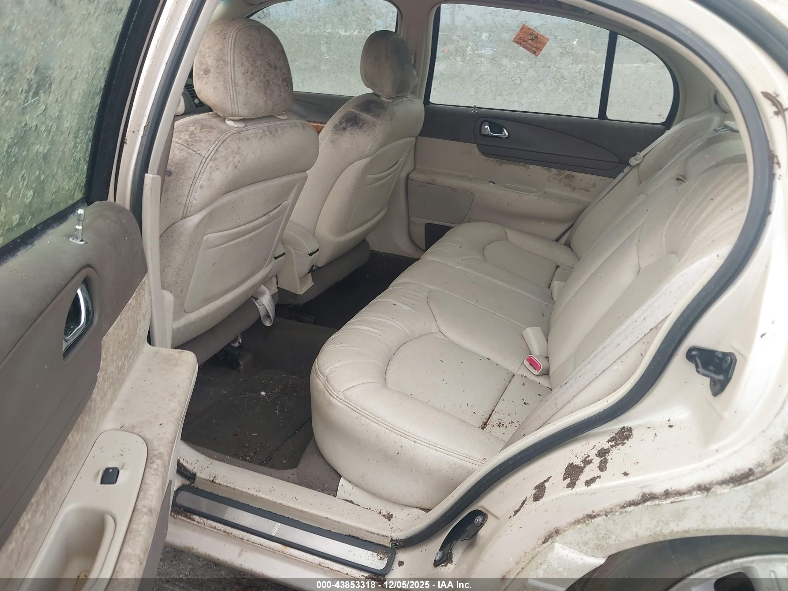 1999 Lincoln Continental   Champagne vin: 1LNHM97V1XY697540