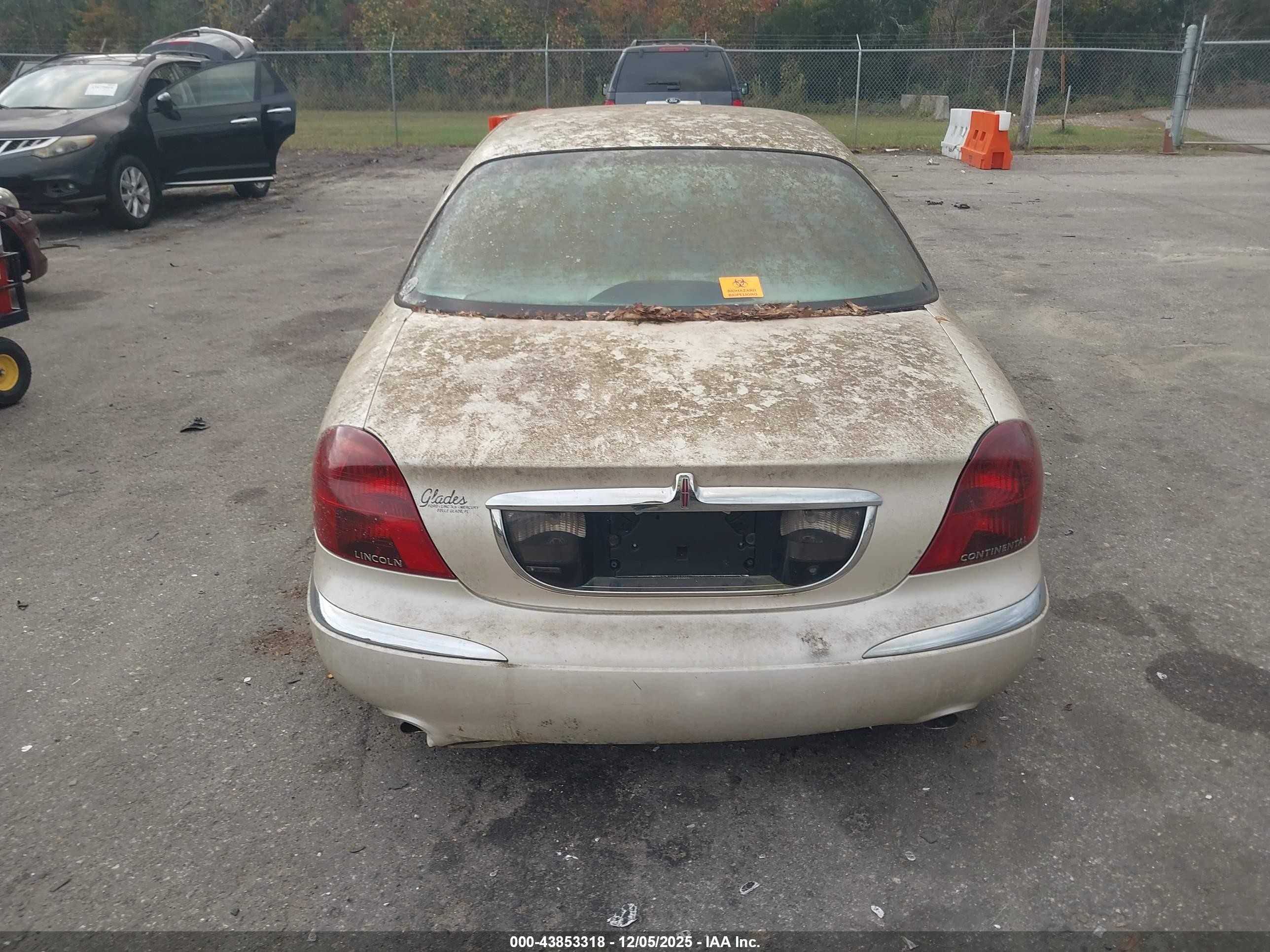 1999 Lincoln Continental   Champagne vin: 1LNHM97V1XY697540