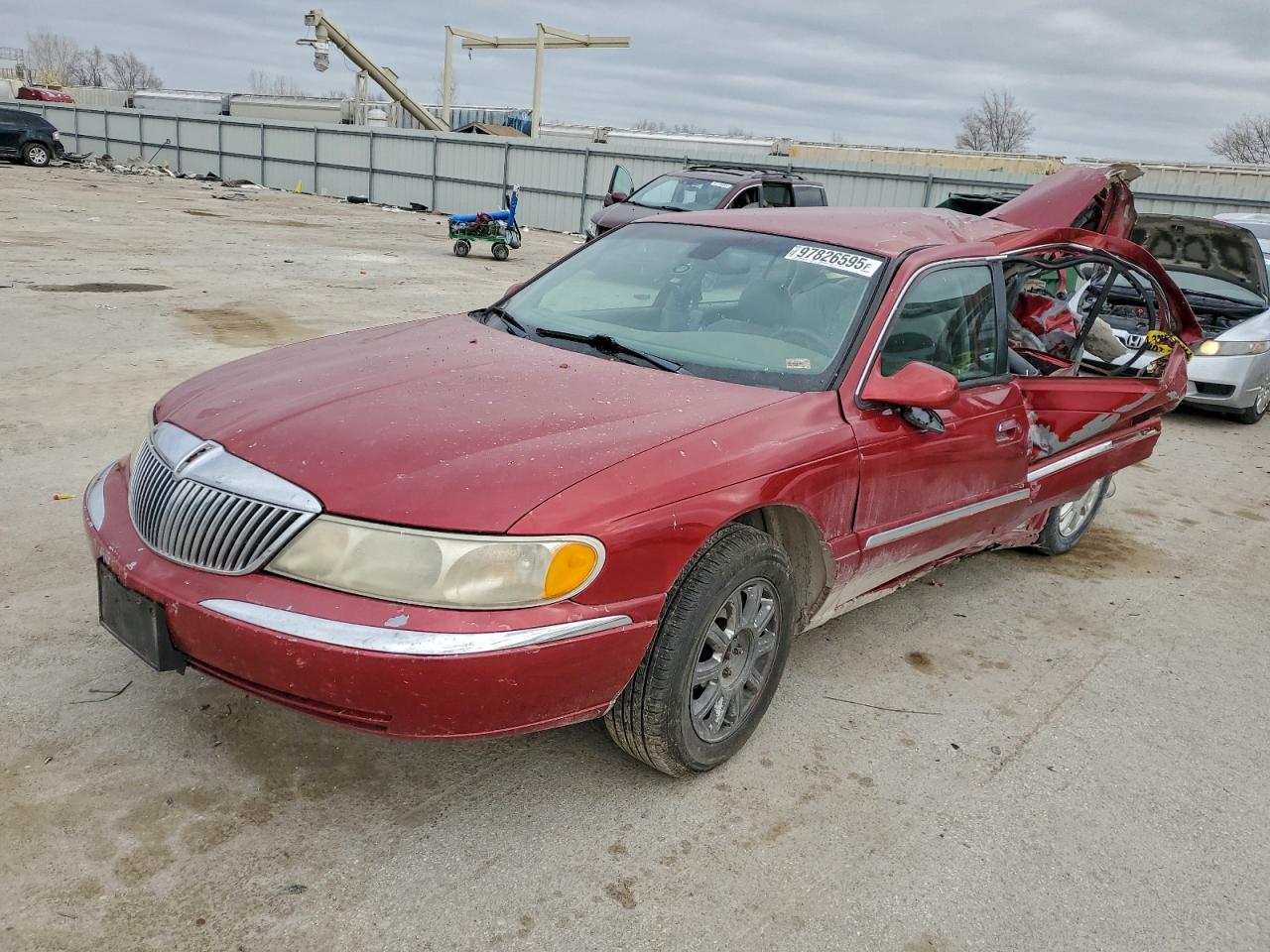1999 Lincoln Continental Red vin: 1LNHM97V1XY711677