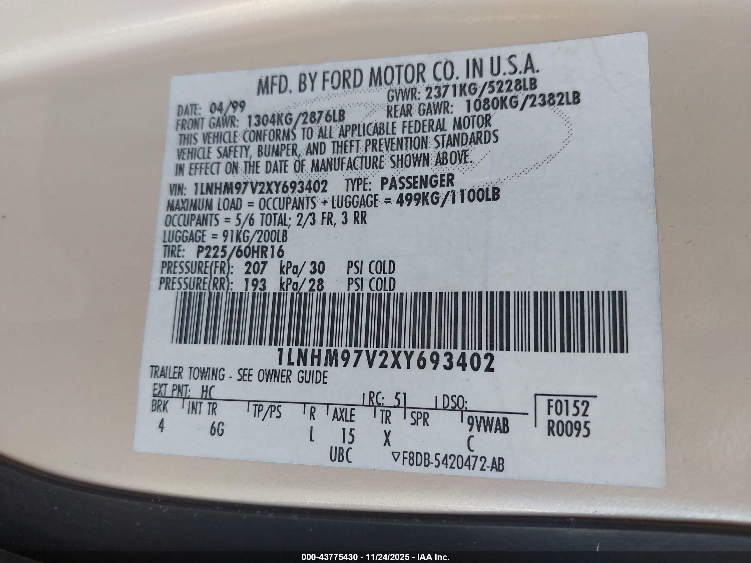 1999 Lincoln Continental   Champagne vin: 1LNHM97V2XY693402