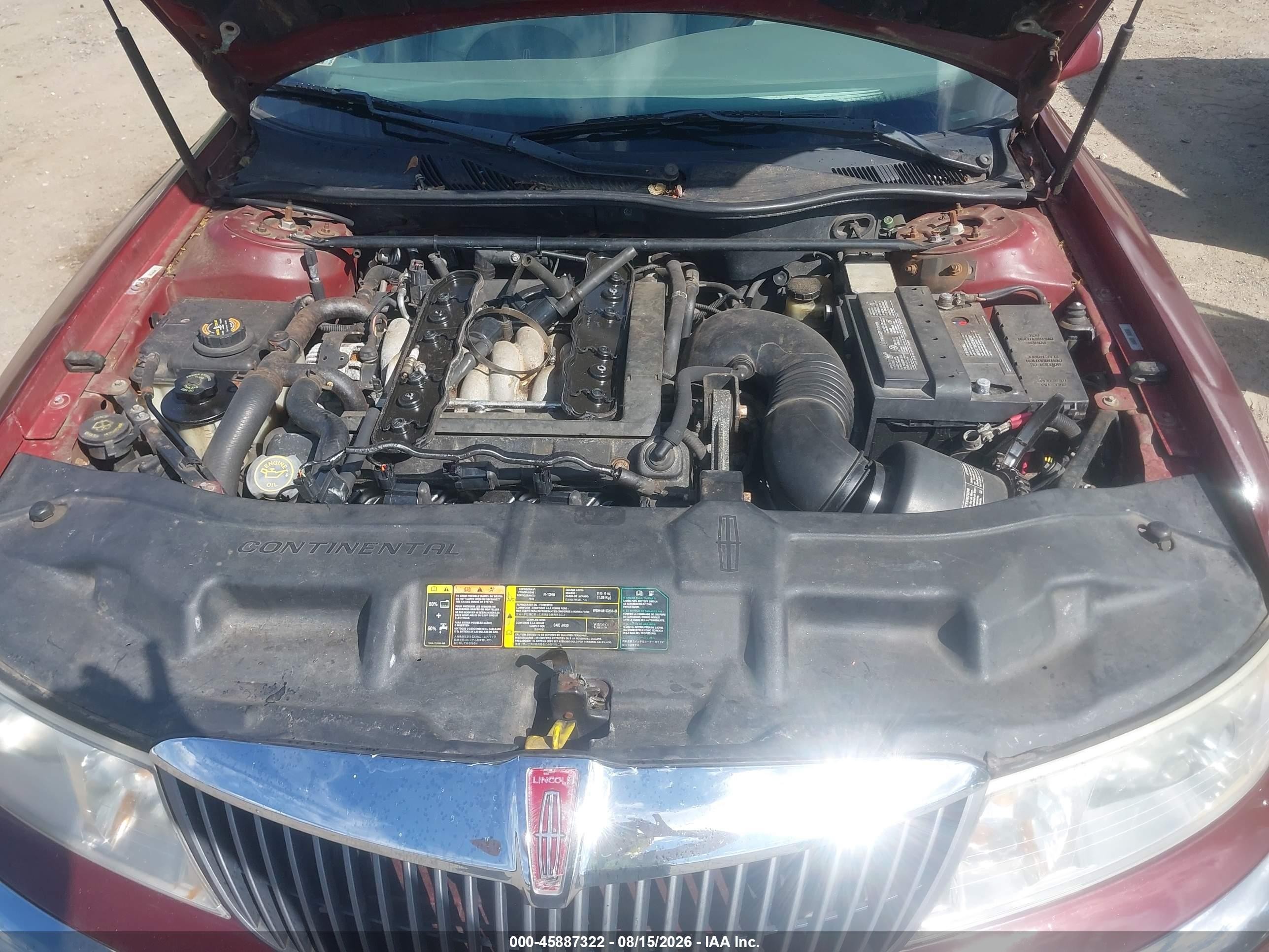 2000 Lincoln Continental   Maroon vin: 1LNHM97V2YY889261
