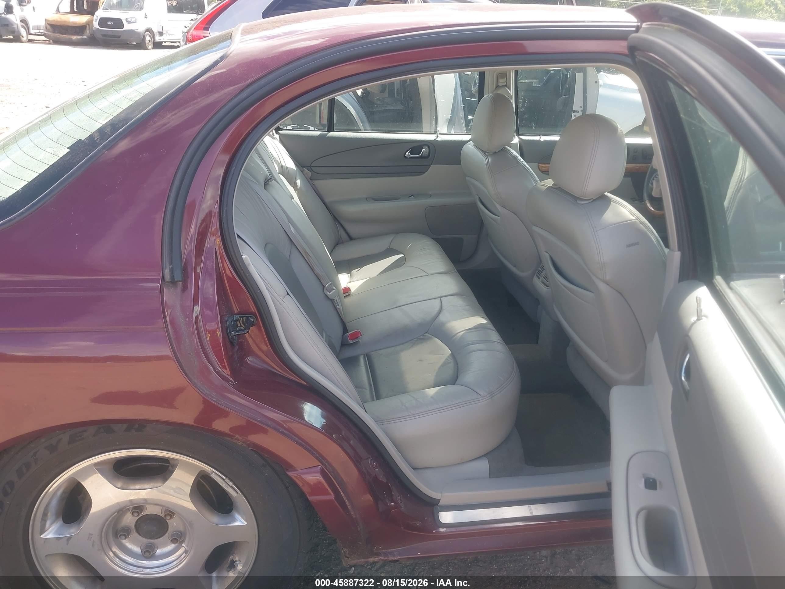 2000 Lincoln Continental   Maroon vin: 1LNHM97V2YY889261