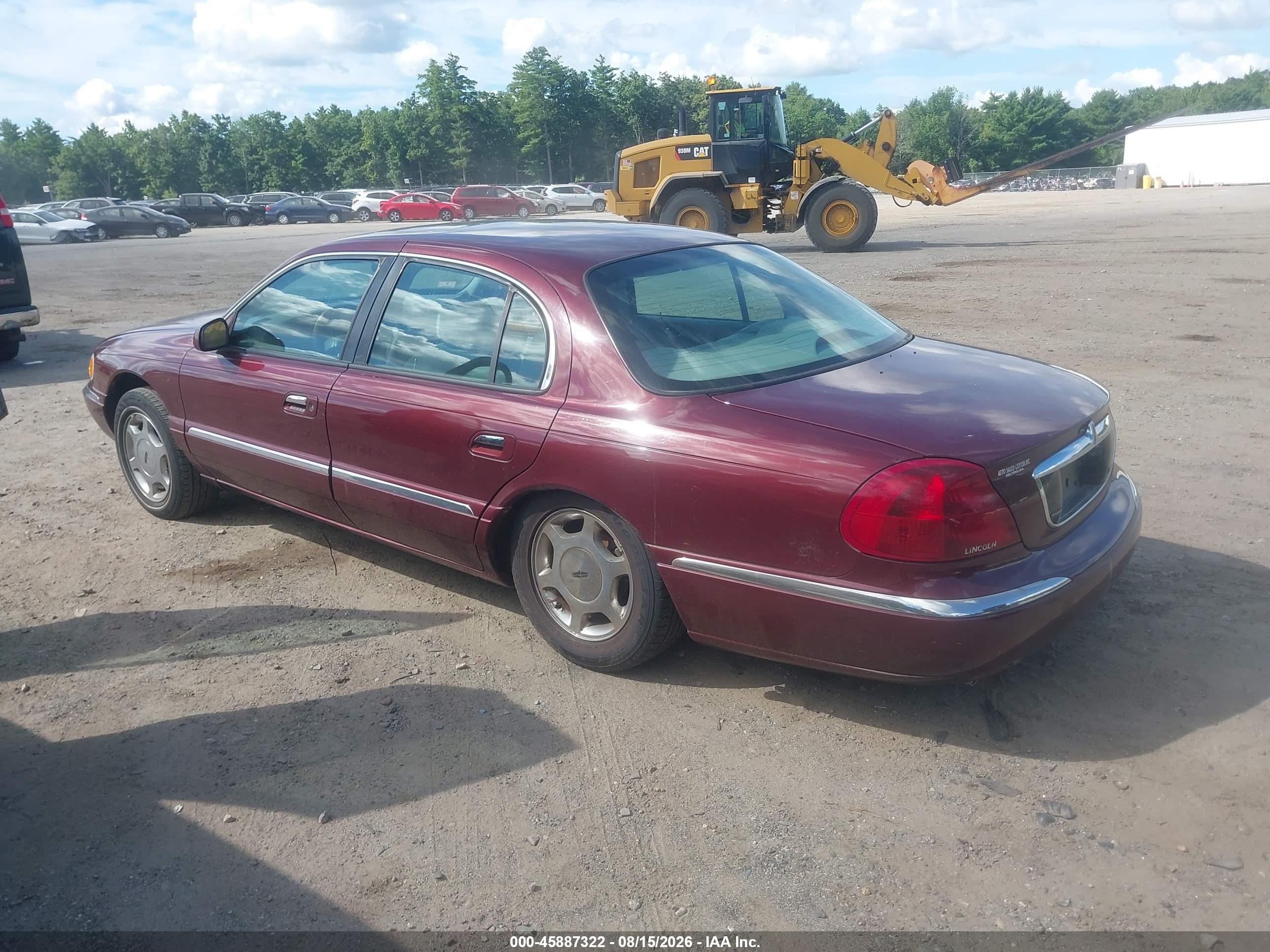 2000 Lincoln Continental   Maroon vin: 1LNHM97V2YY889261