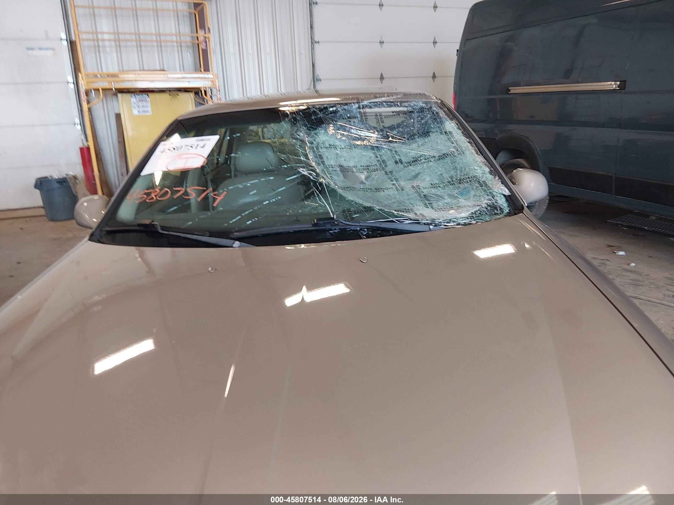 2002 Lincoln Continental   Tan vin: 1LNHM97V32Y695992