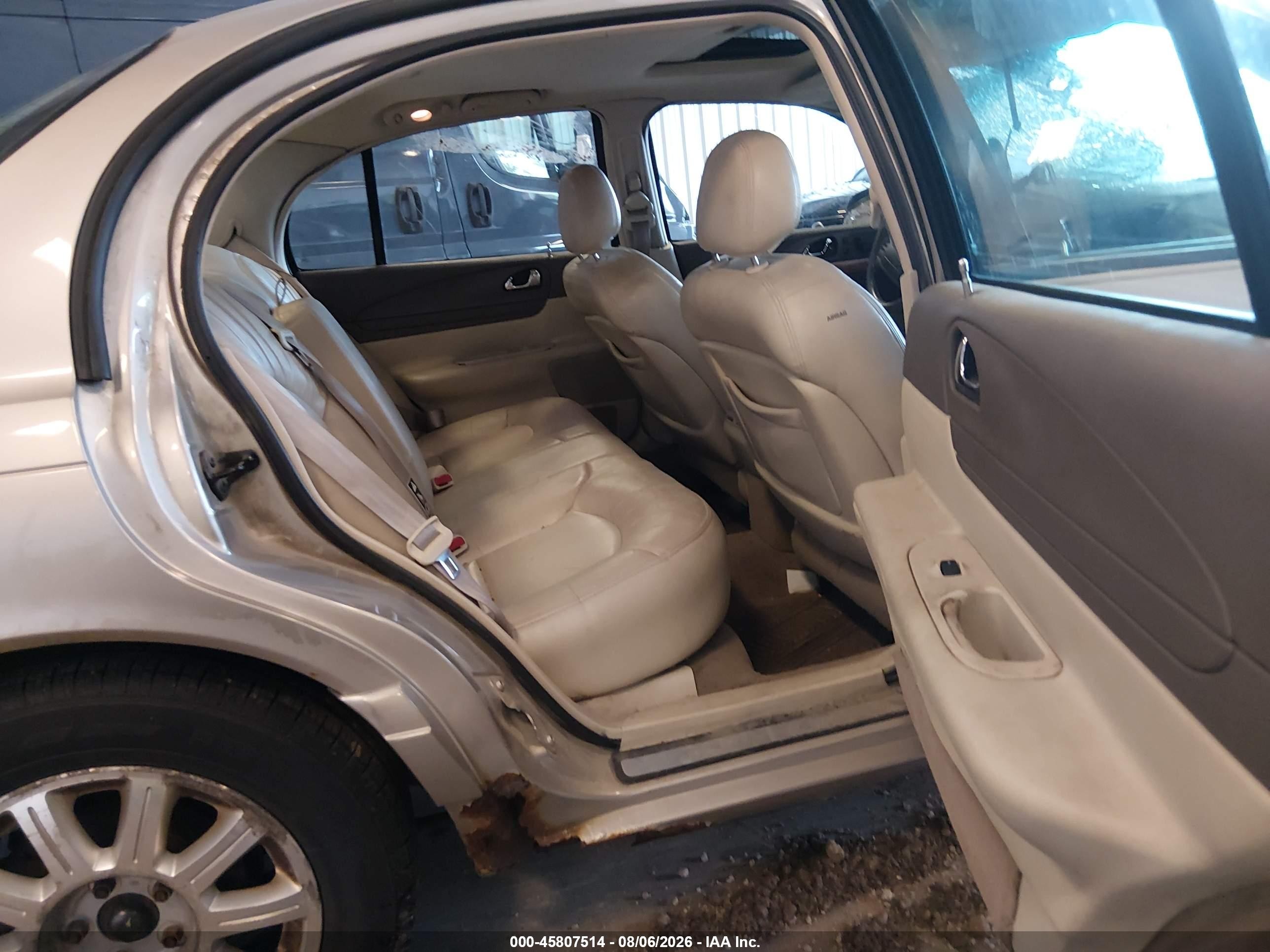 2002 Lincoln Continental   Tan vin: 1LNHM97V32Y695992