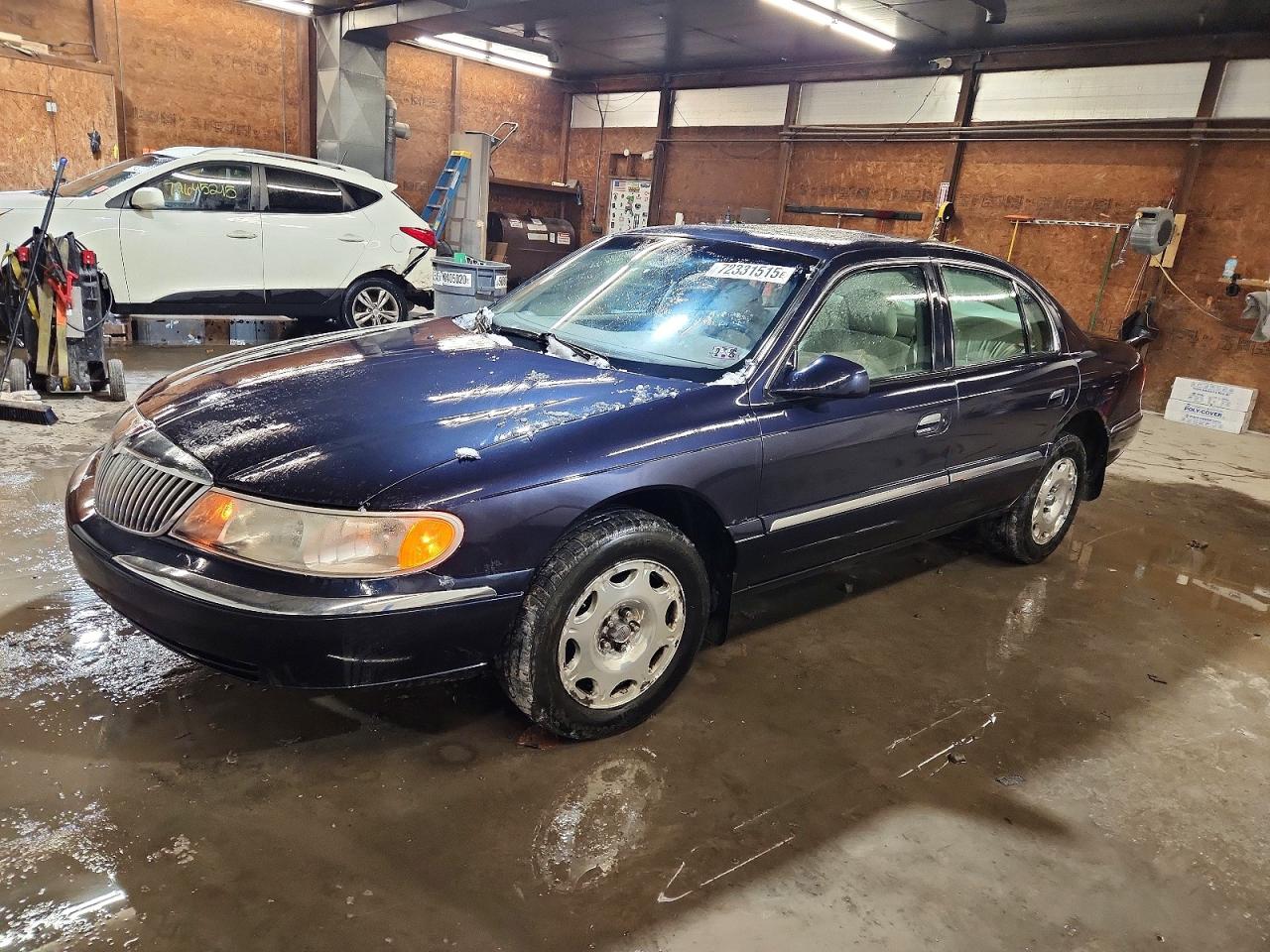 1999 Lincoln Continental Blue vin: 1LNHM97V3XY651210