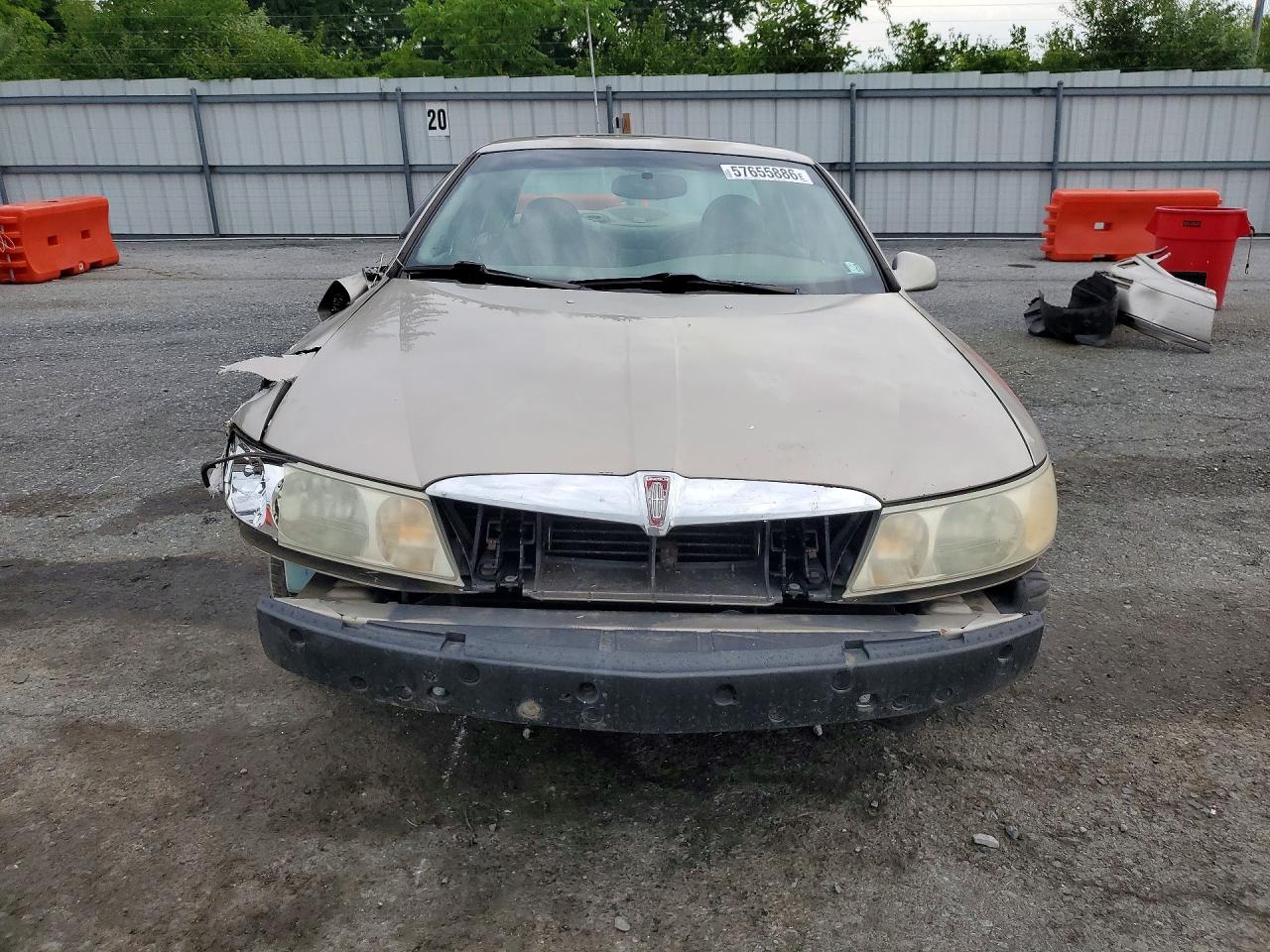 1999 Lincoln Continental Tan vin: 1LNHM97V3XY715827