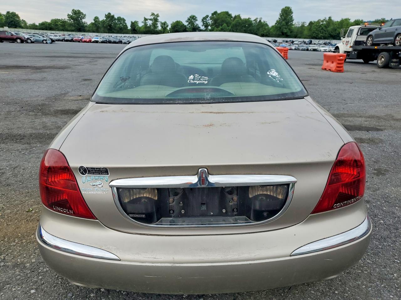1999 Lincoln Continental Tan vin: 1LNHM97V3XY715827