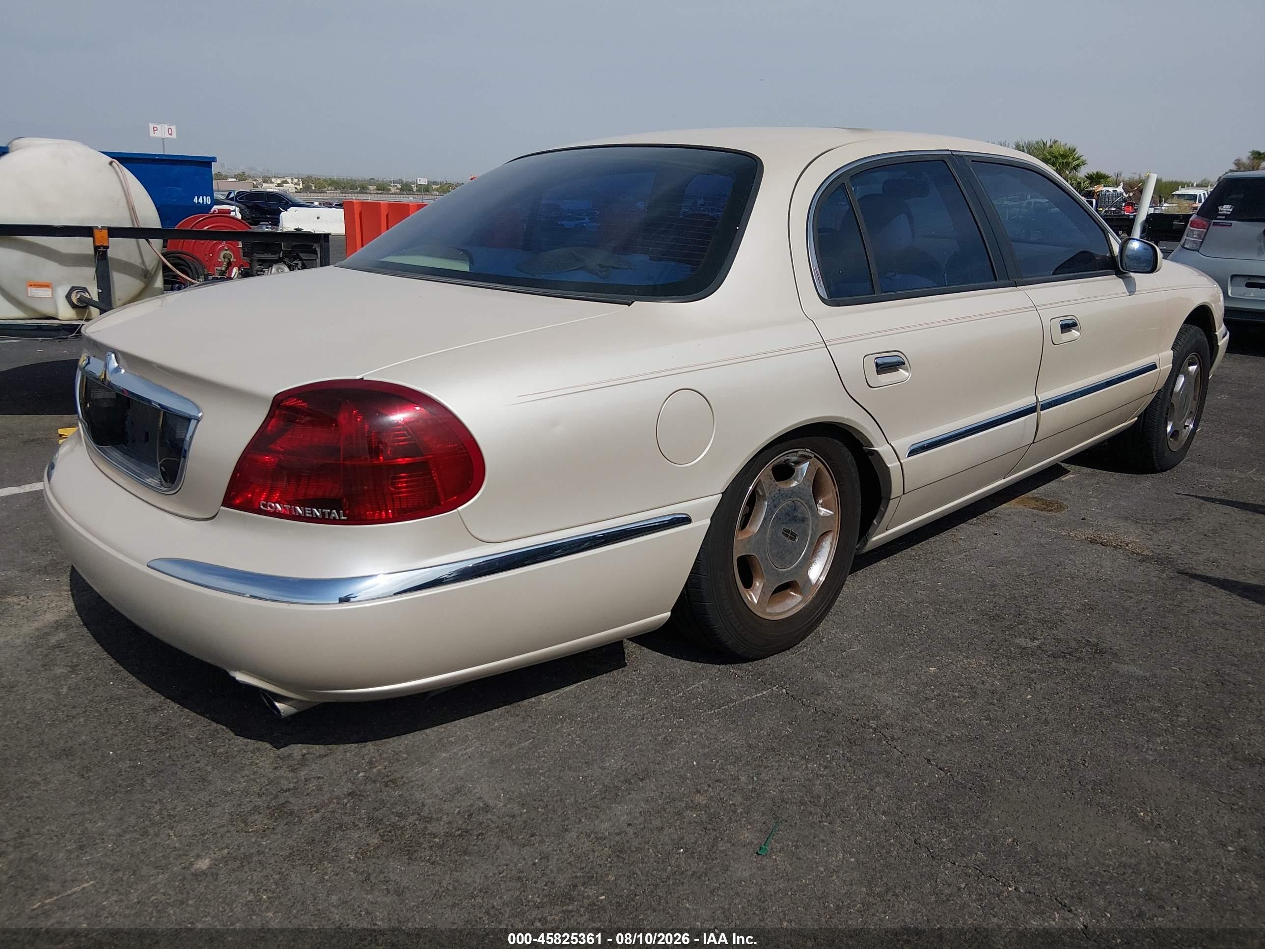 2001 Lincoln Continental   Beige vin: 1LNHM97V41Y600418