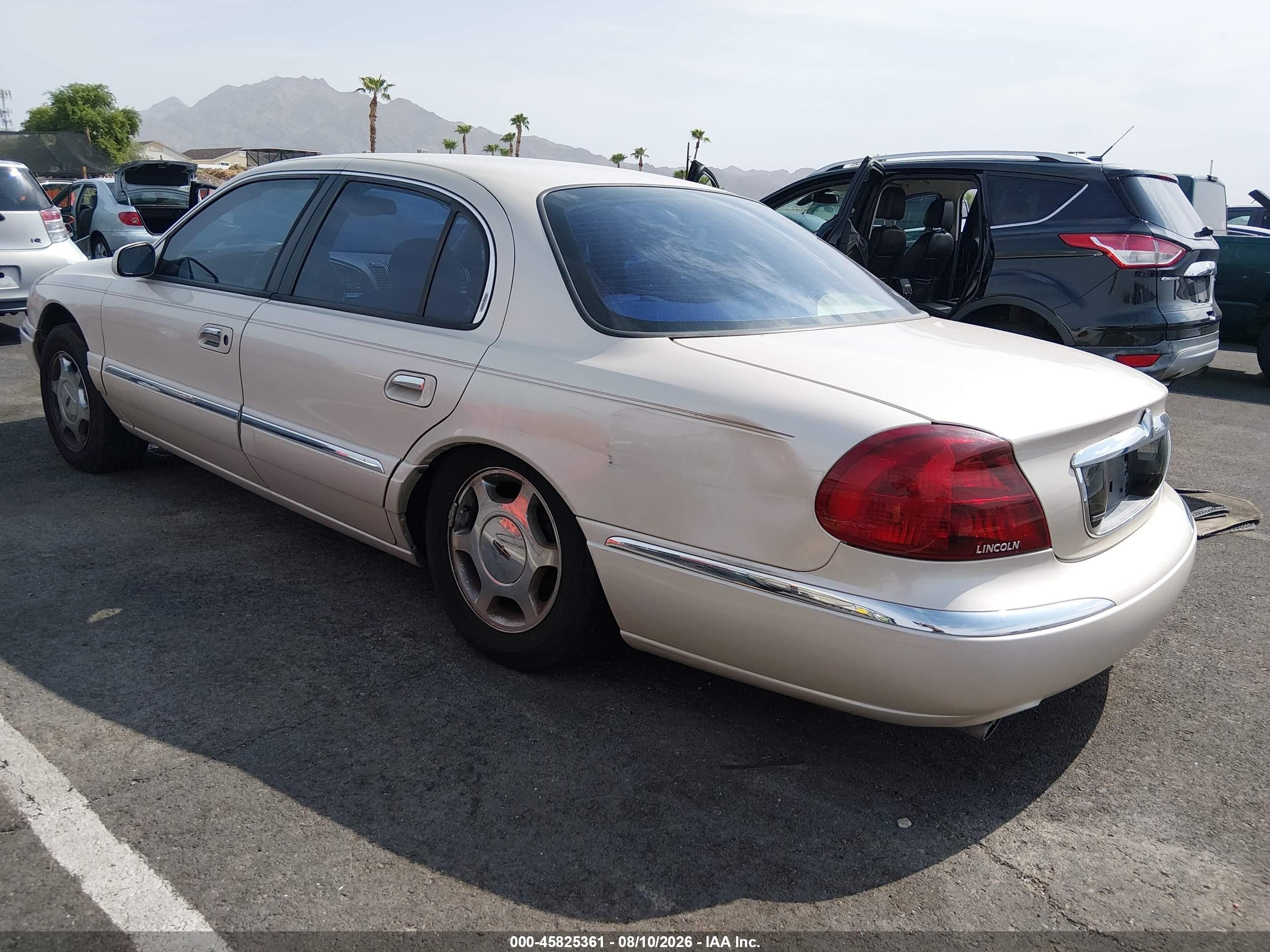 2001 Lincoln Continental   Beige vin: 1LNHM97V41Y600418