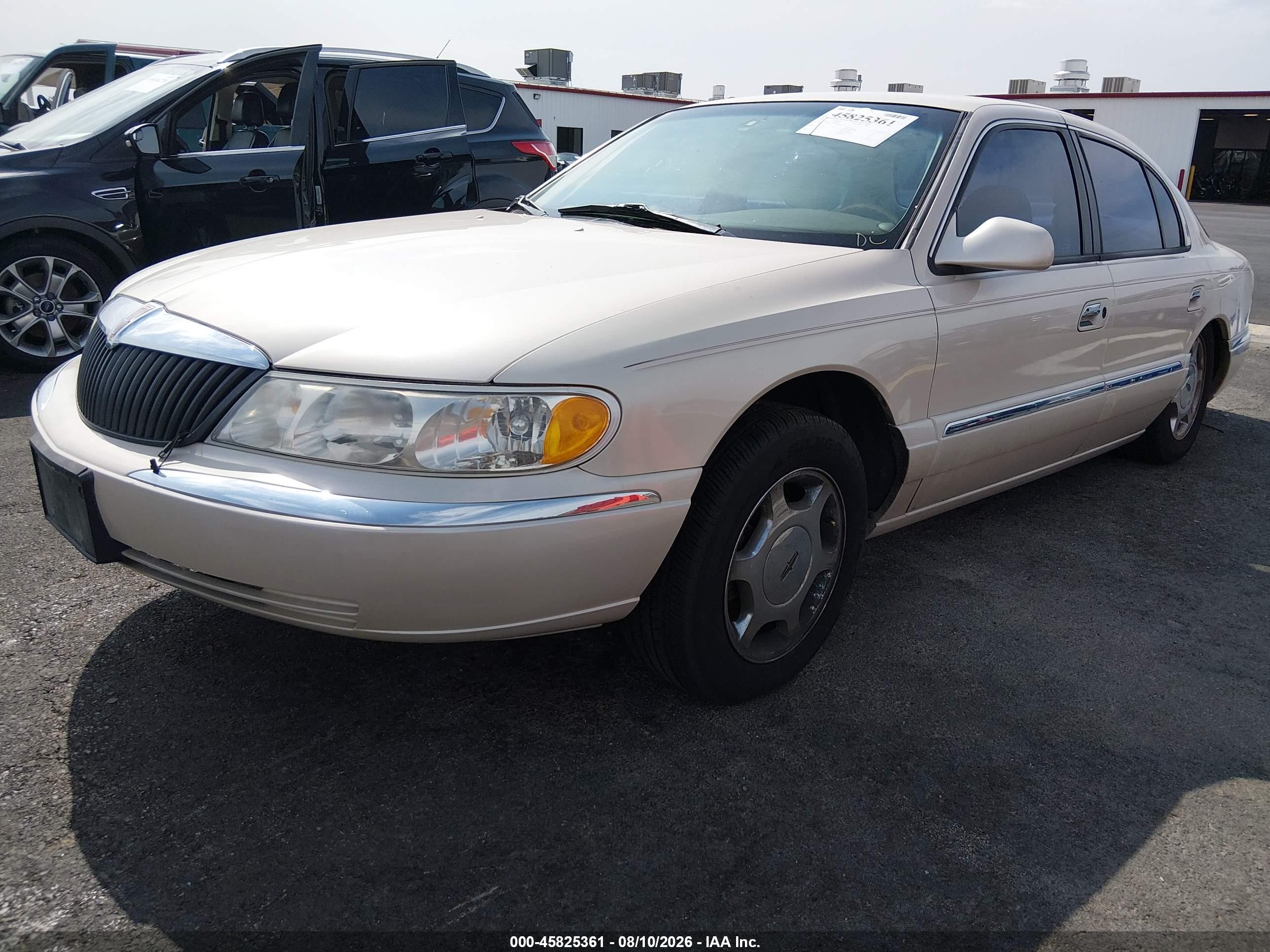2001 Lincoln Continental   Beige vin: 1LNHM97V41Y600418