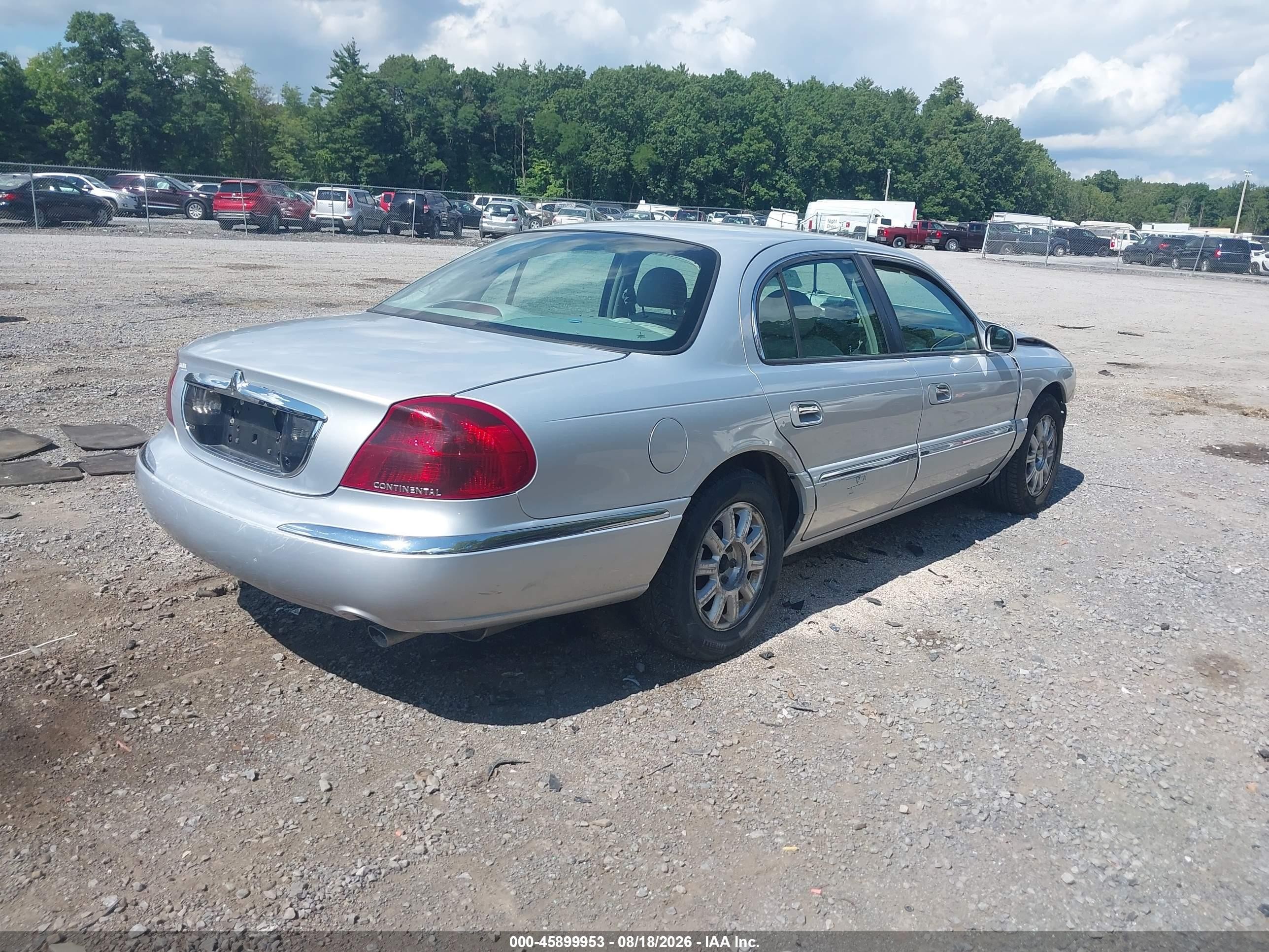 2002 Lincoln Continental   Silver vin: 1LNHM97V52Y616922