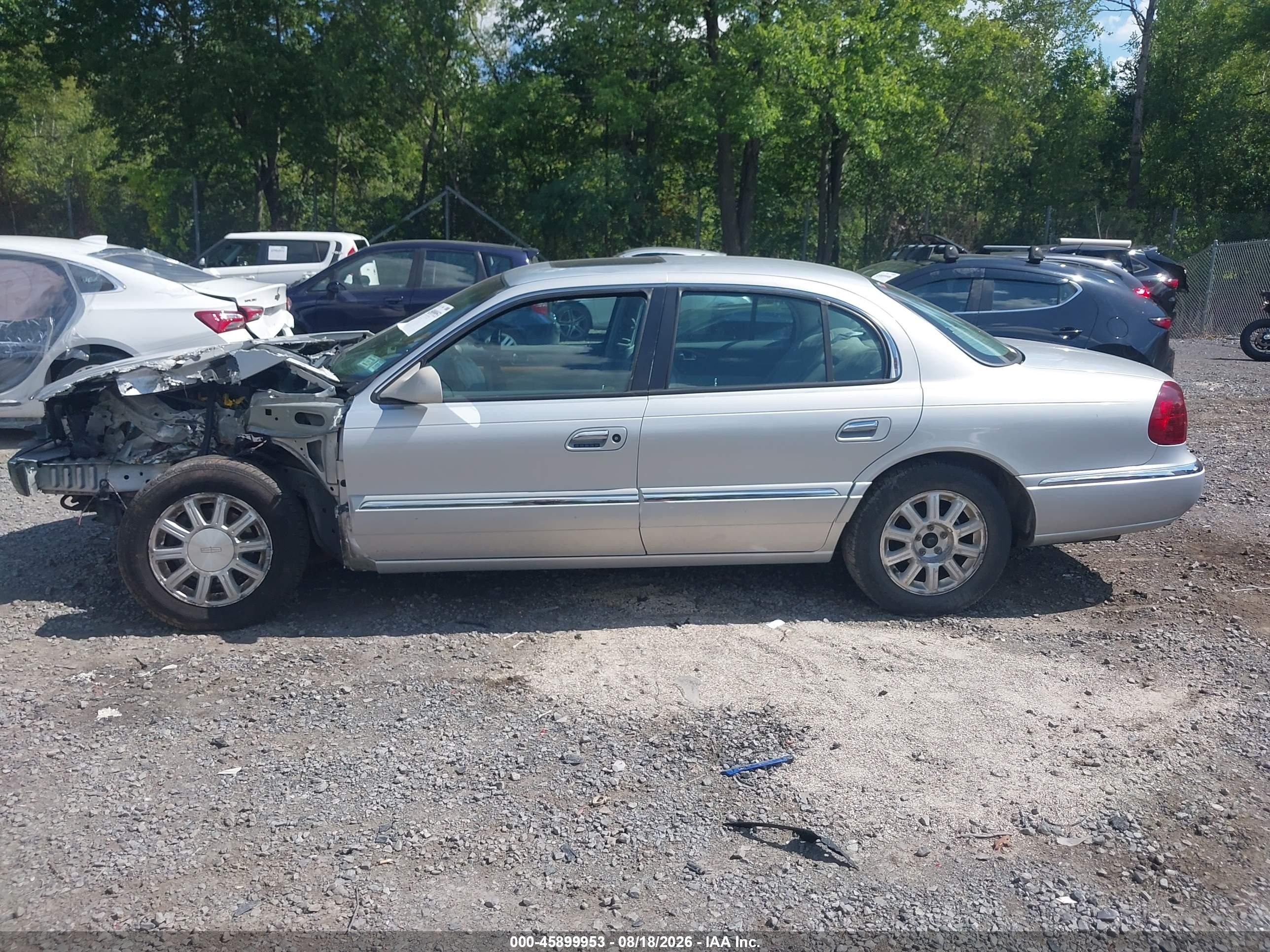 2002 Lincoln Continental   Silver vin: 1LNHM97V52Y616922