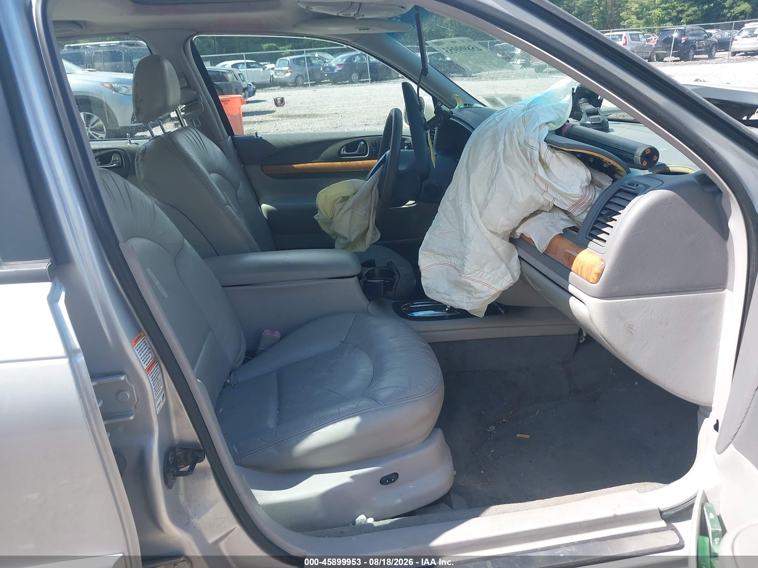 2002 Lincoln Continental   Silver vin: 1LNHM97V52Y616922