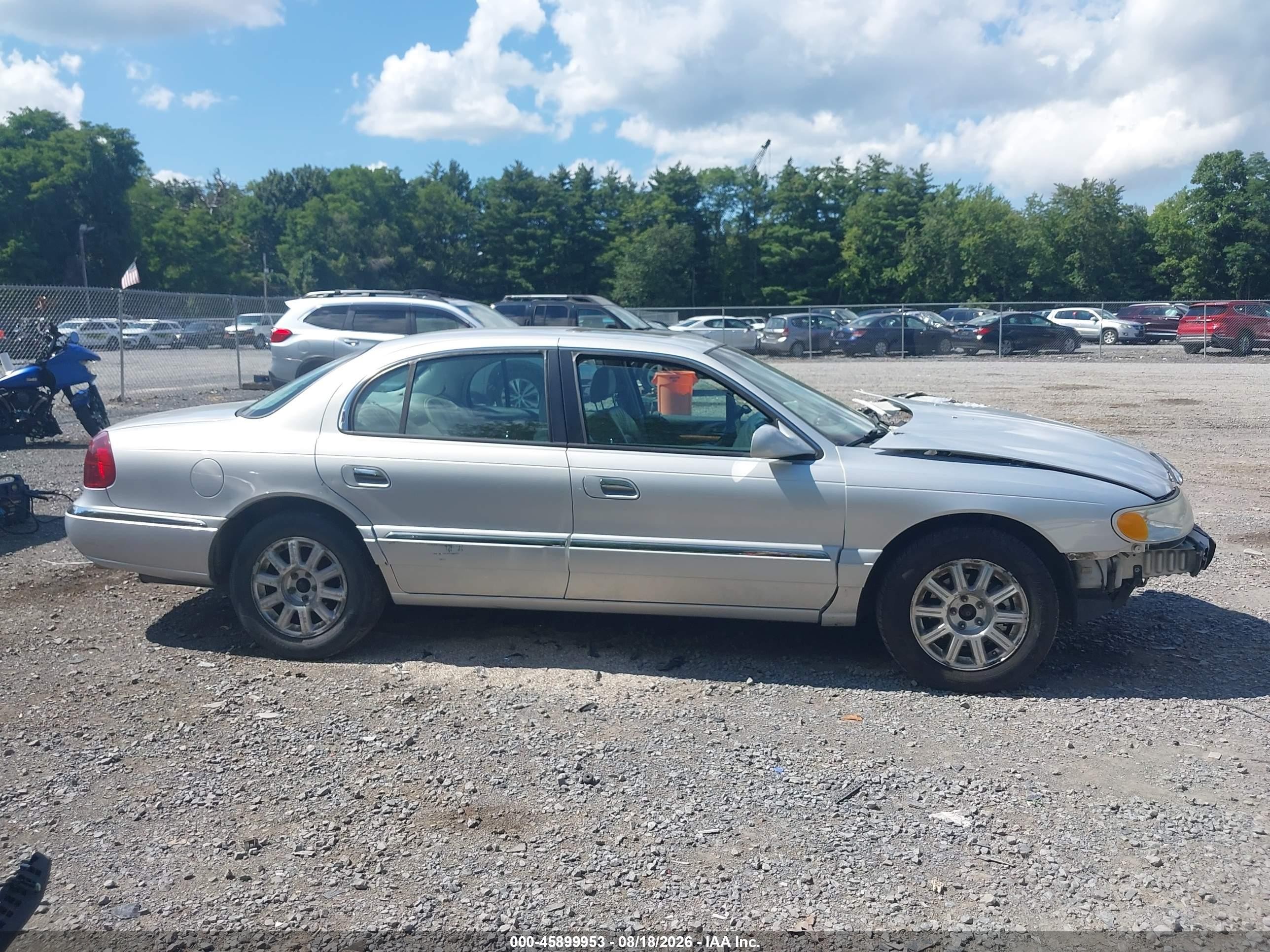 2002 Lincoln Continental   Silver vin: 1LNHM97V52Y616922