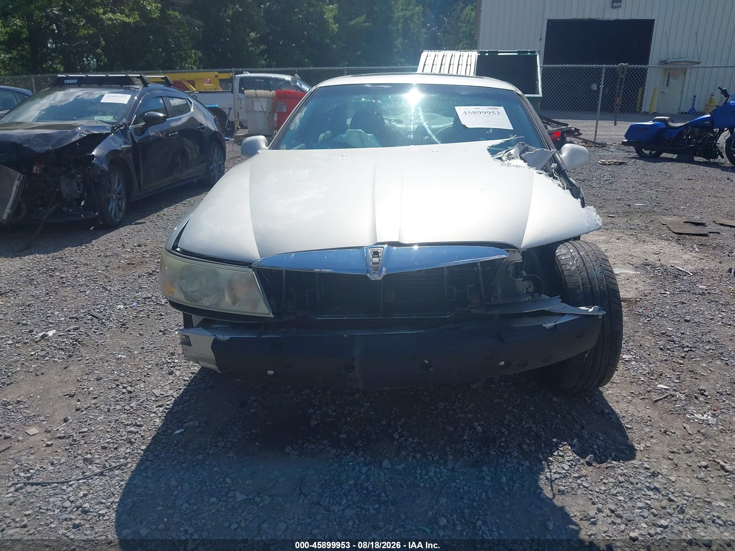 2002 Lincoln Continental   Silver vin: 1LNHM97V52Y616922