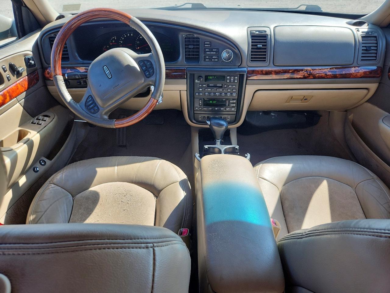 2002 Lincoln Continental Tan vin: 1LNHM97V52Y700089