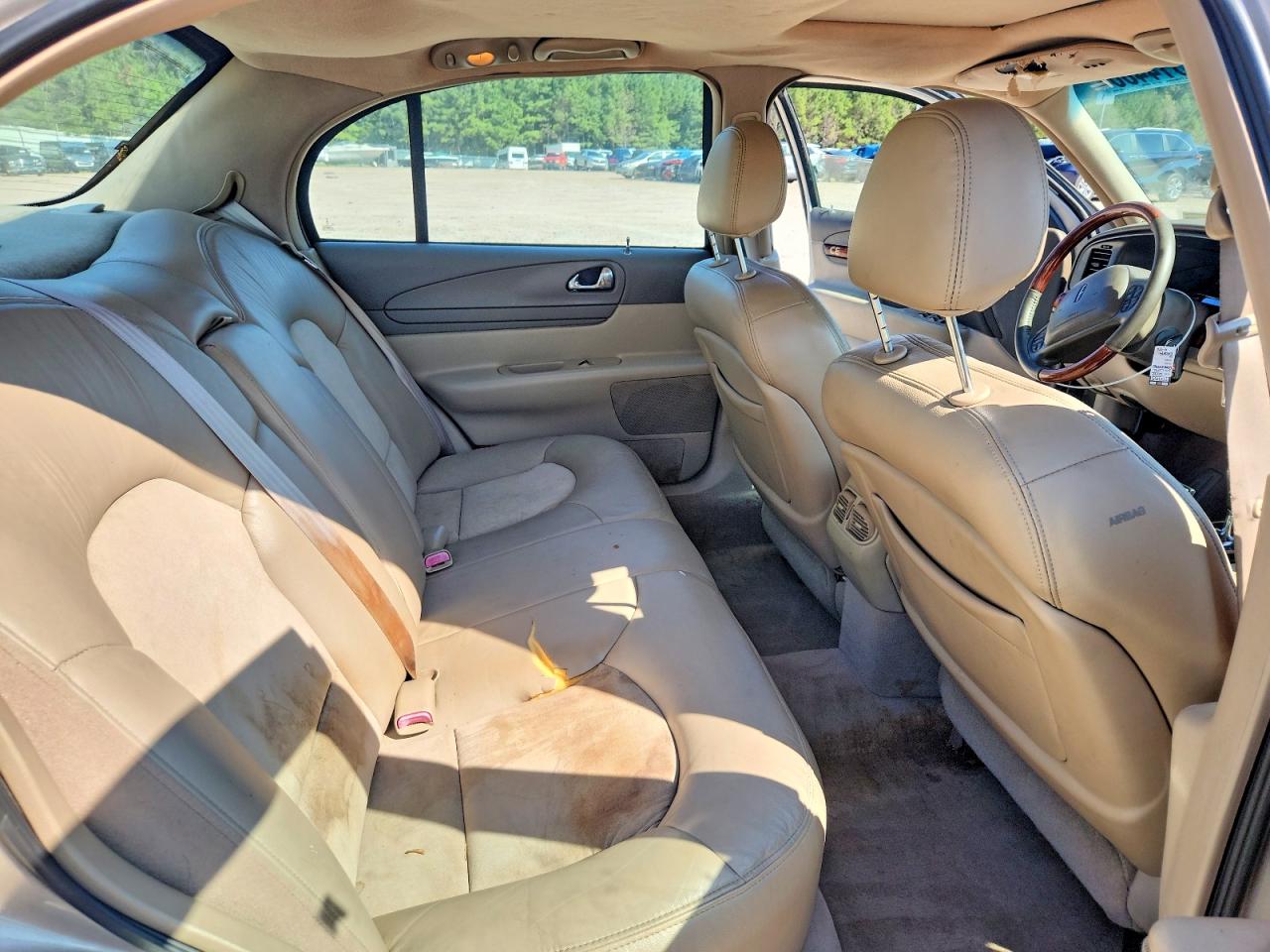 2002 Lincoln Continental Tan vin: 1LNHM97V52Y700089