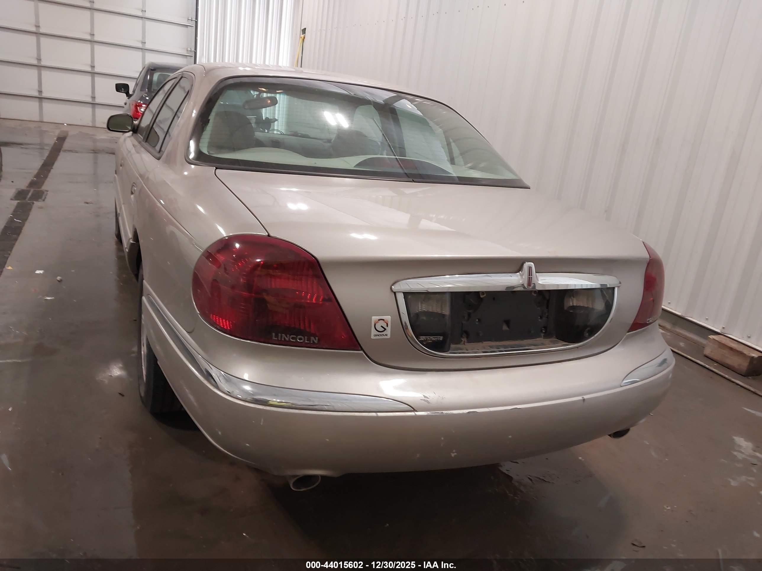 1999 Lincoln Continental   Gold vin: 1LNHM97V5XY640516