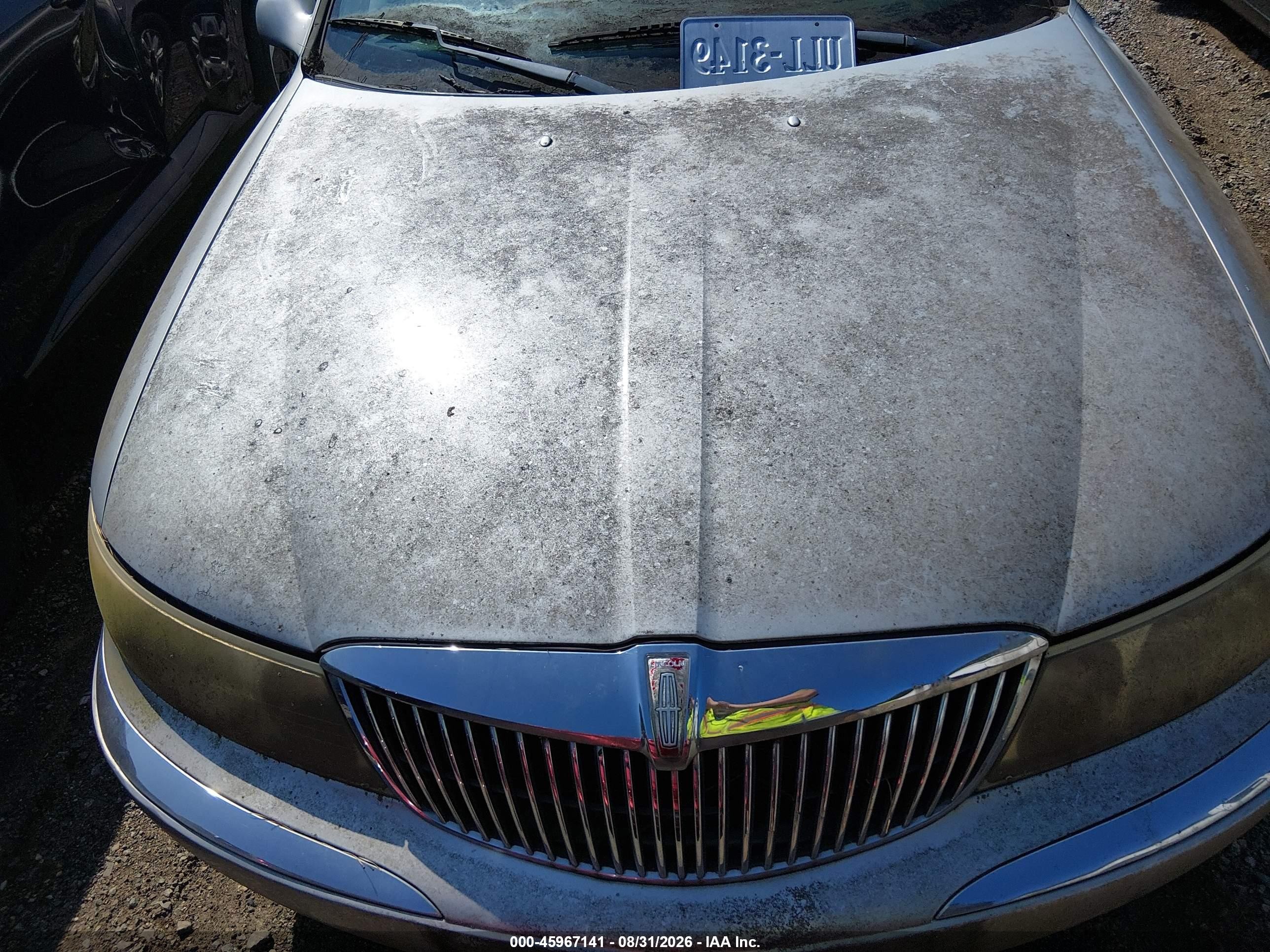 2001 Lincoln Continental   Silver vin: 1LNHM97V61Y670602