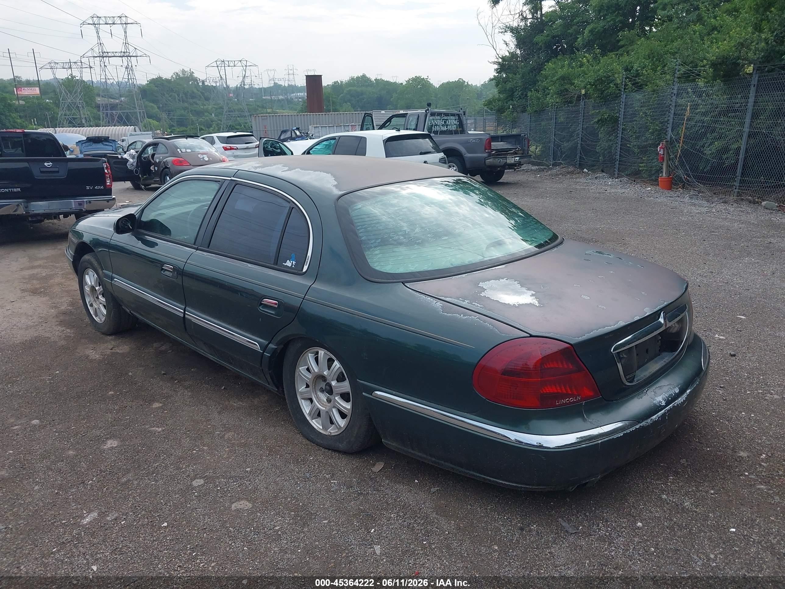 2001 Lincoln Continental   Green vin: 1LNHM97V71Y695850