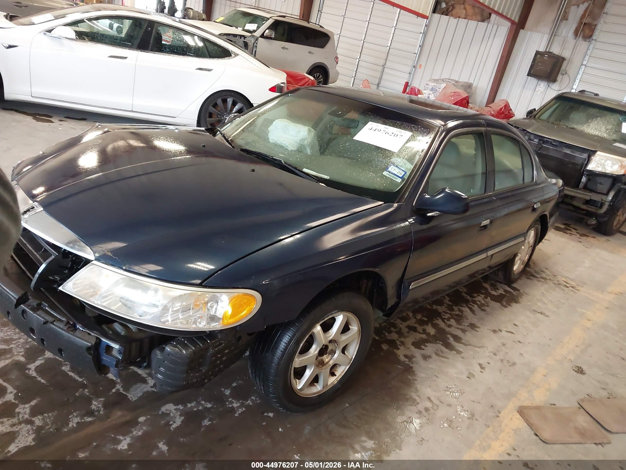 2002 Lincoln Continental   Dark Blue vin: 1LNHM97V72Y683327