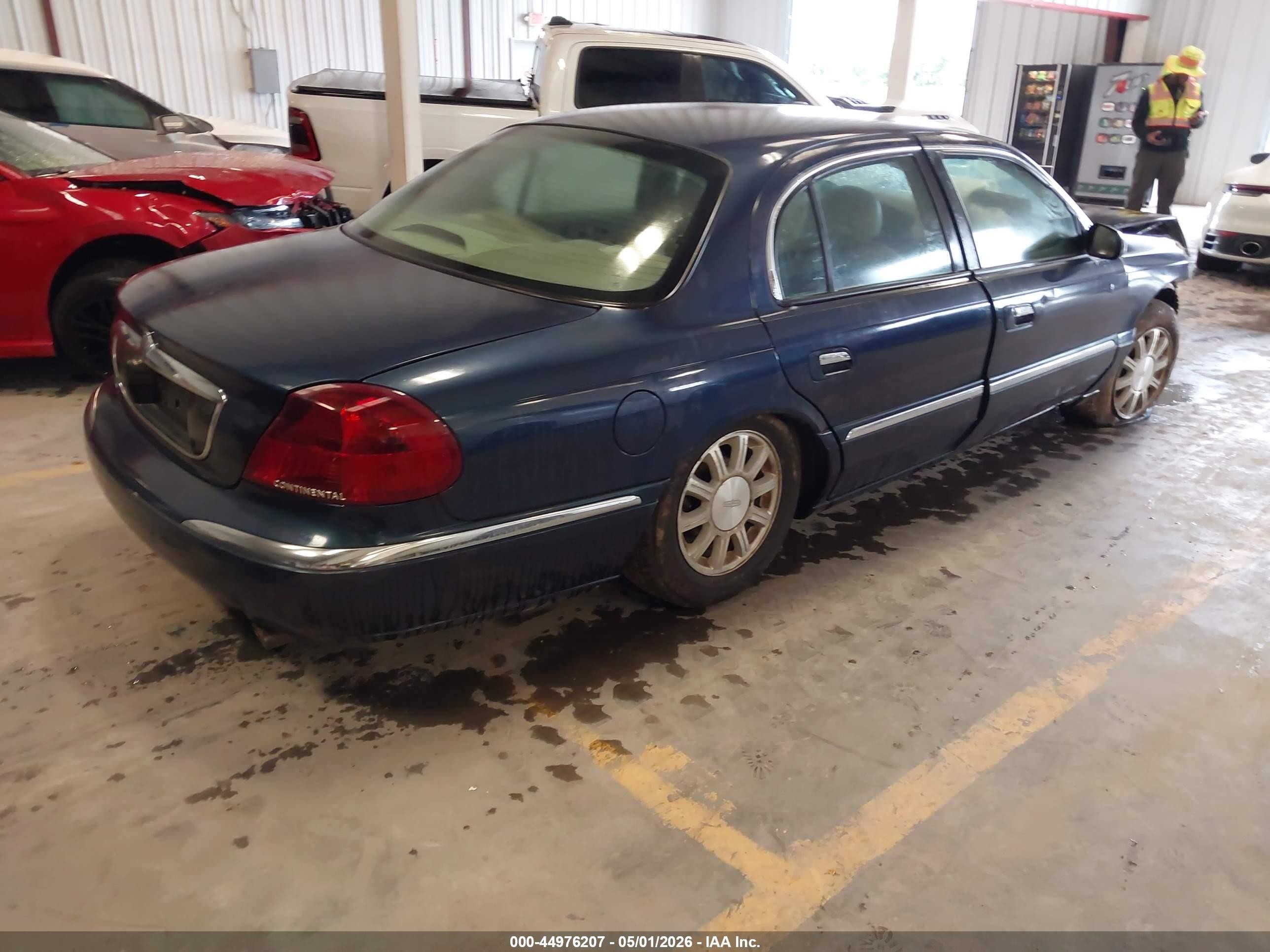 2002 Lincoln Continental   Dark Blue vin: 1LNHM97V72Y683327