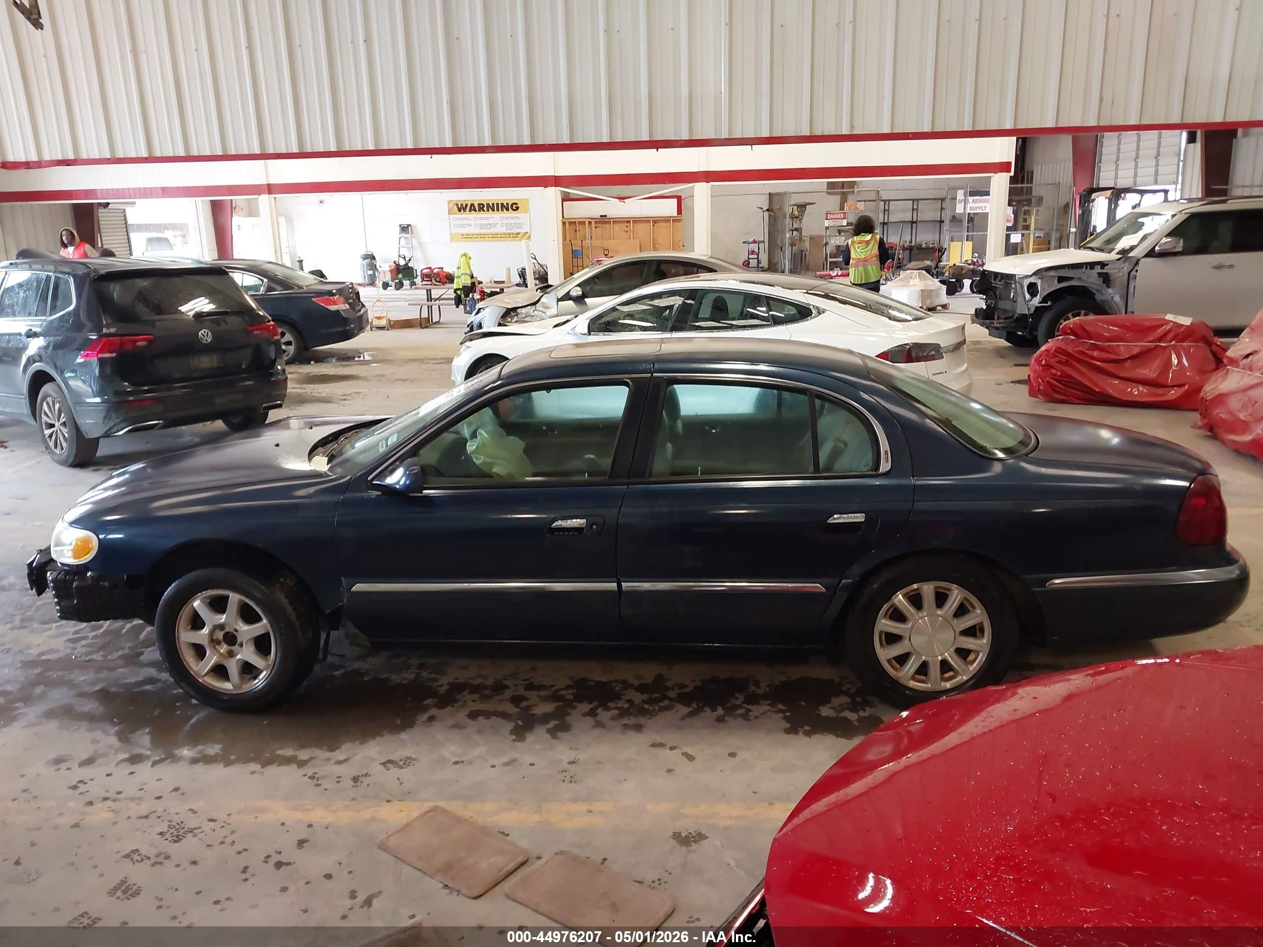 2002 Lincoln Continental   Dark Blue vin: 1LNHM97V72Y683327