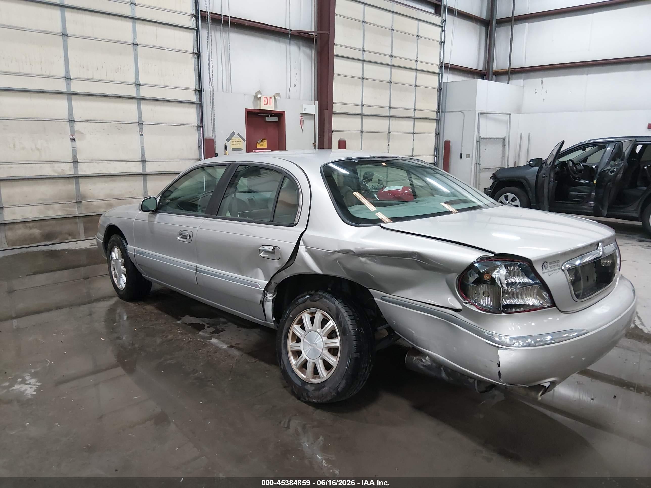 2002 Lincoln Continental   Gray vin: 1LNHM97V82Y684888