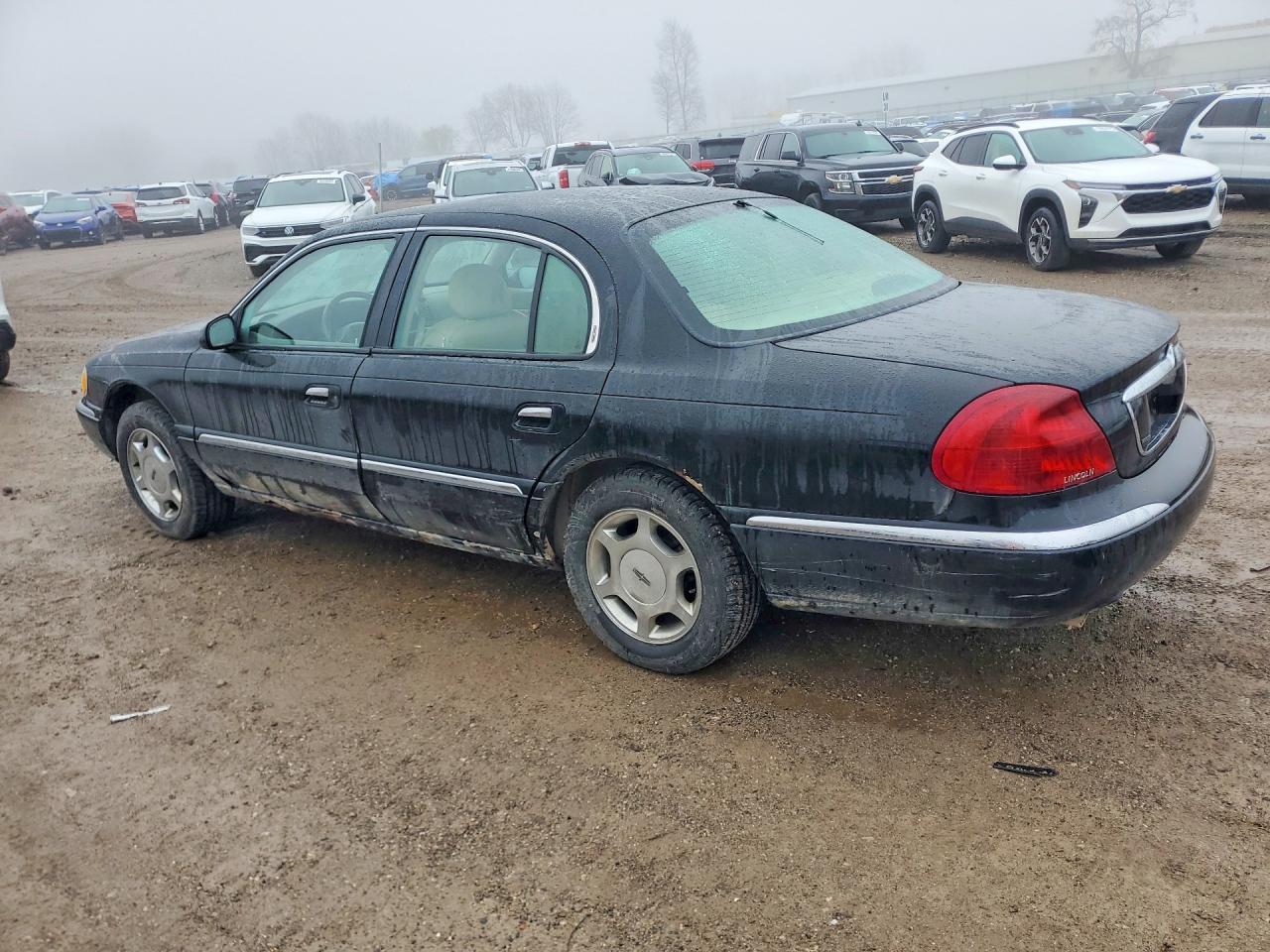 1999 Lincoln Continental Black vin: 1LNHM97V8XY705097