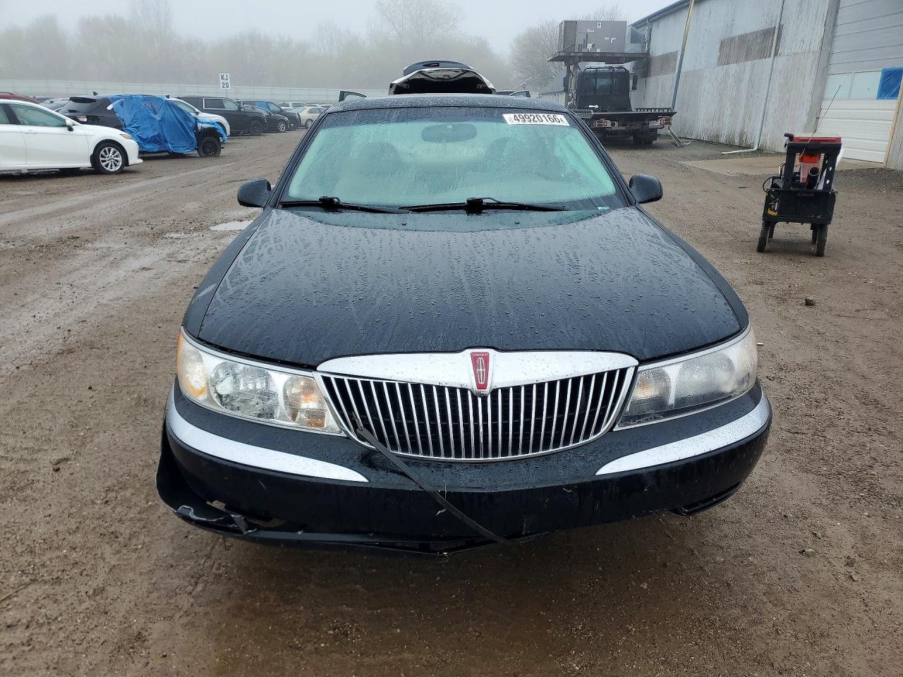 1999 Lincoln Continental Black vin: 1LNHM97V8XY705097