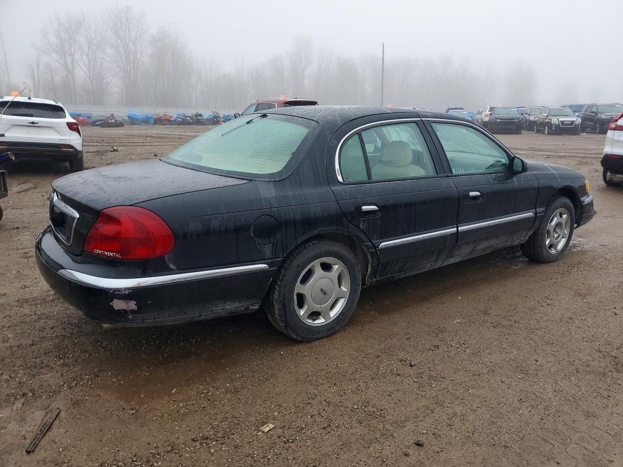 1999 Lincoln Continental Black vin: 1LNHM97V8XY705097