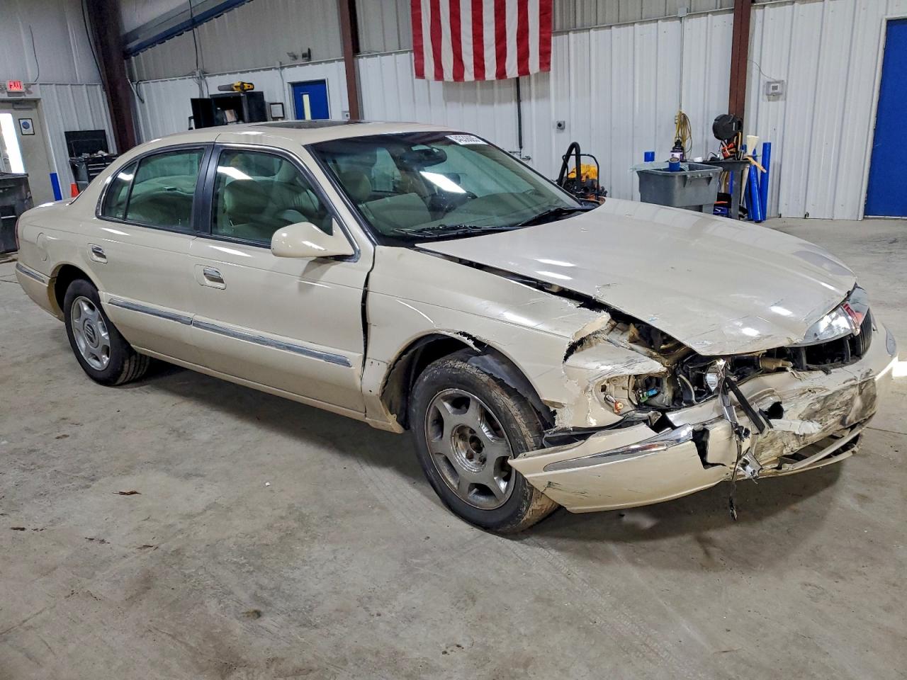 1999 Lincoln Continental Tan vin: 1LNHM97V8XY715869