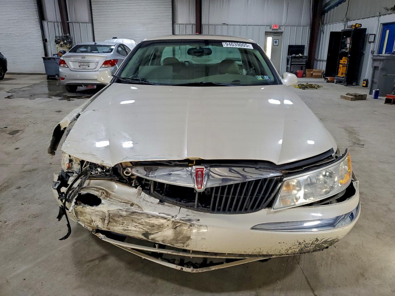 1999 Lincoln Continental Tan vin: 1LNHM97V8XY715869