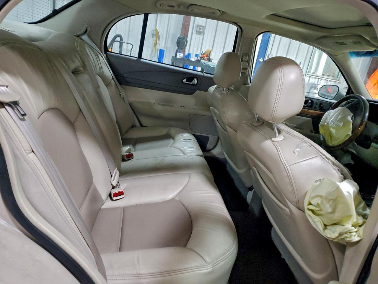 1999 Lincoln Continental Tan vin: 1LNHM97V8XY715869