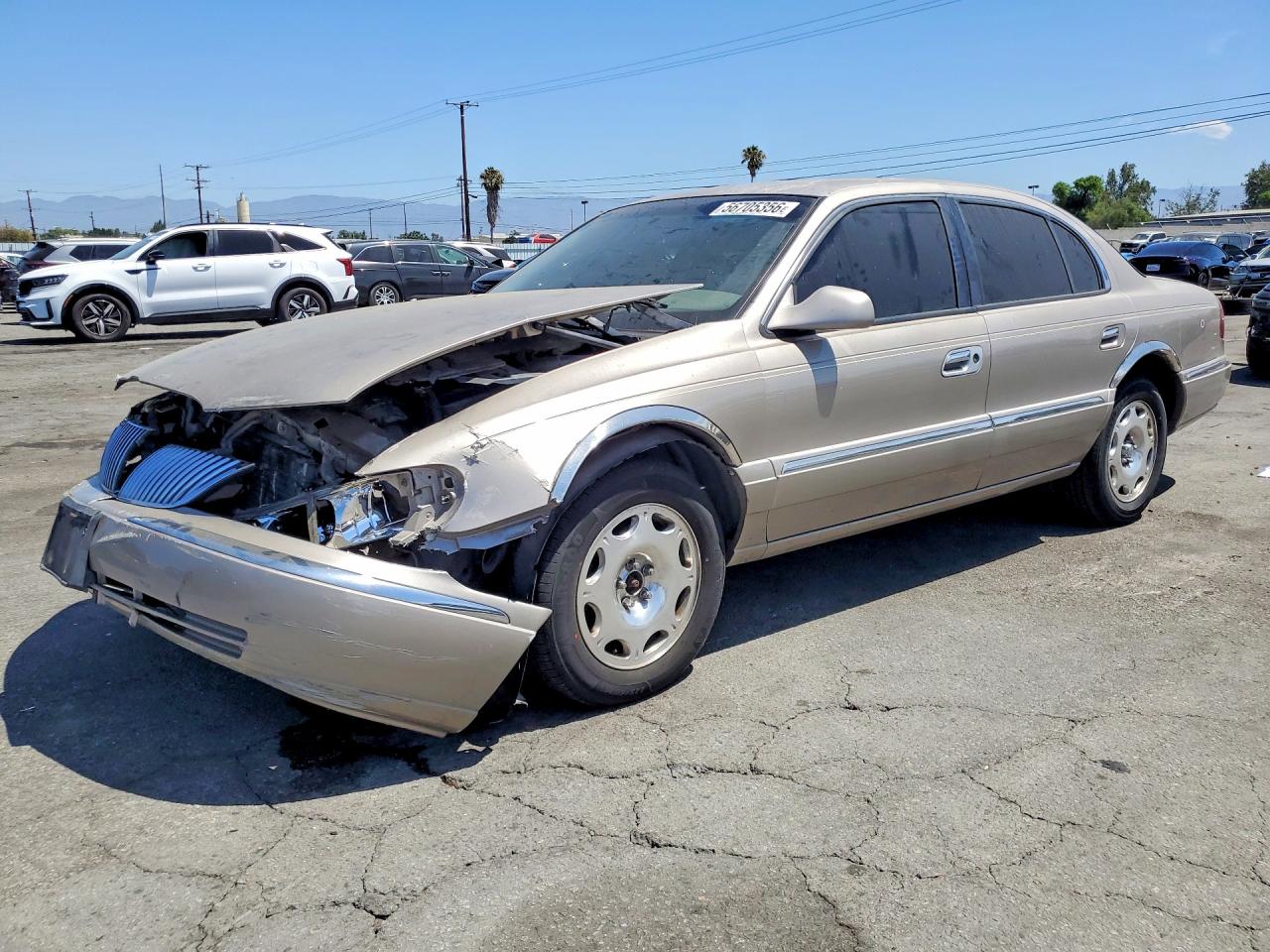 2000 Lincoln Continental Beige vin: 1LNHM97V8YY829940