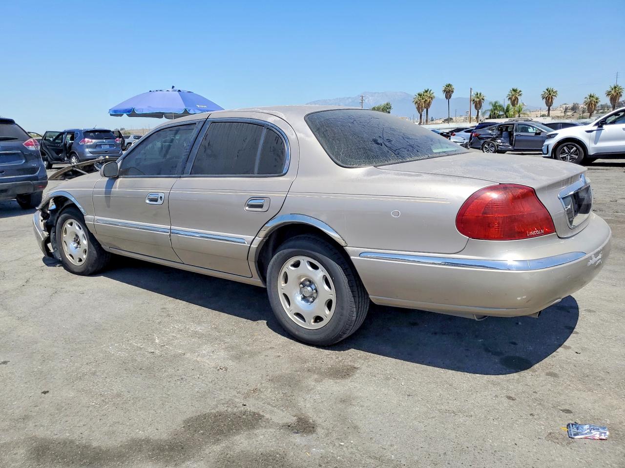 2000 Lincoln Continental Beige vin: 1LNHM97V8YY829940